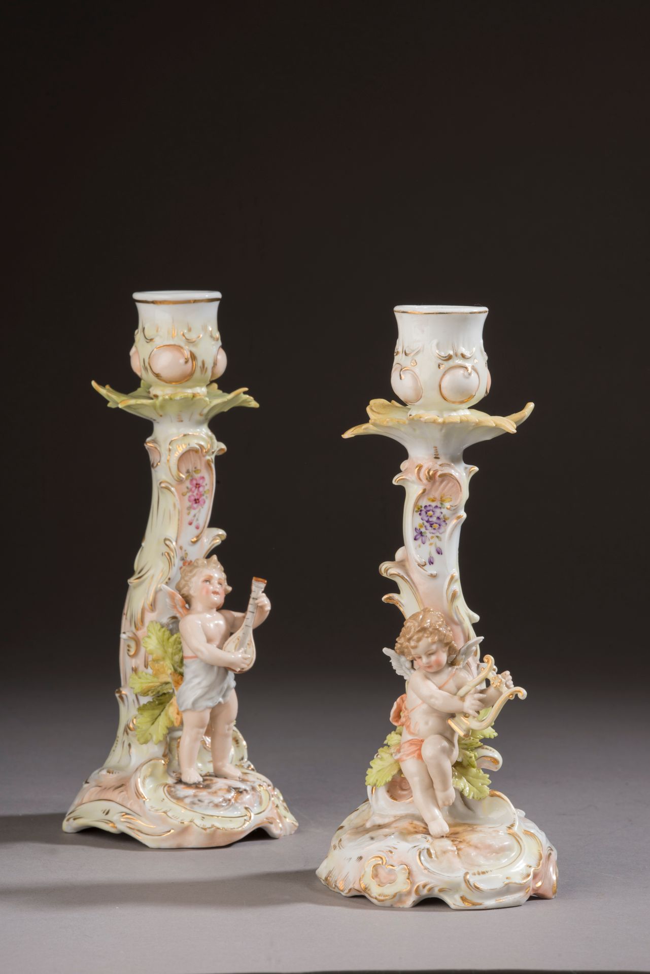 Null Pair of porcelain torches with polychrome decoration and gilded highlights &hellip;