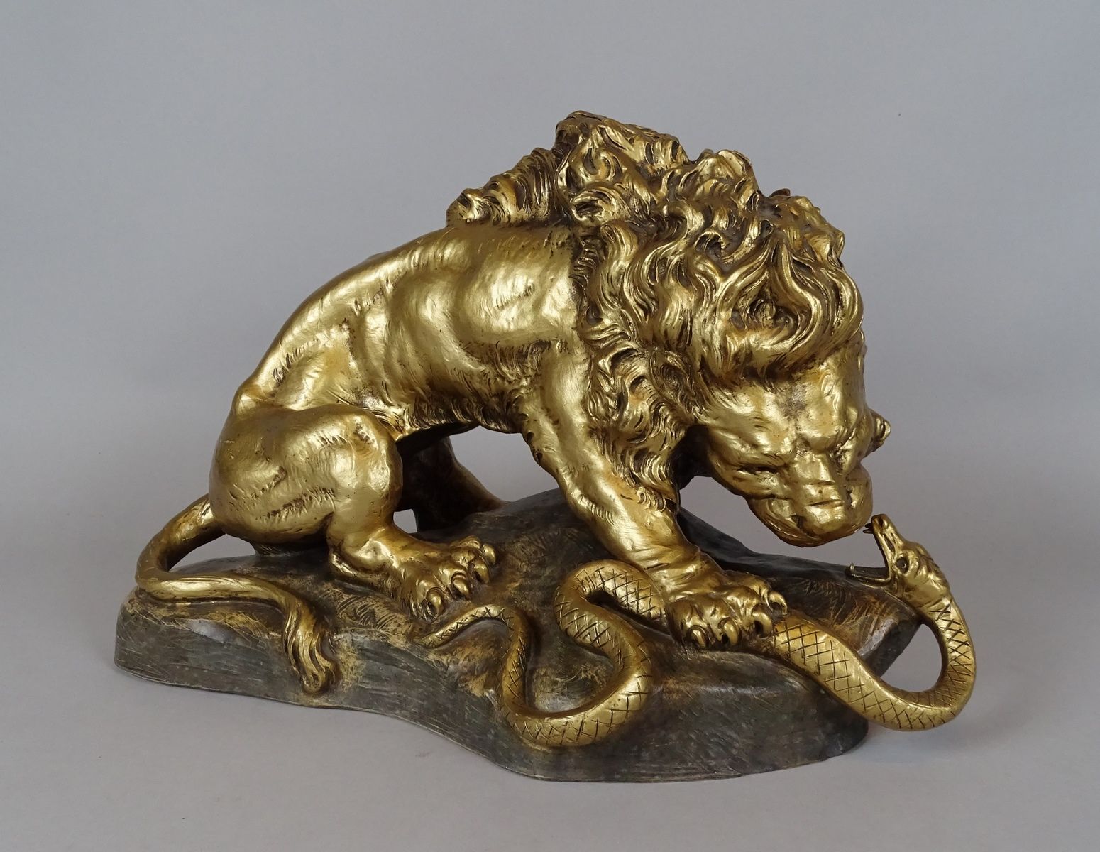 FAGOTTO Armand Sculpture Terre cuite patine dorée (écl) -Lion et serpent- signé &hellip;