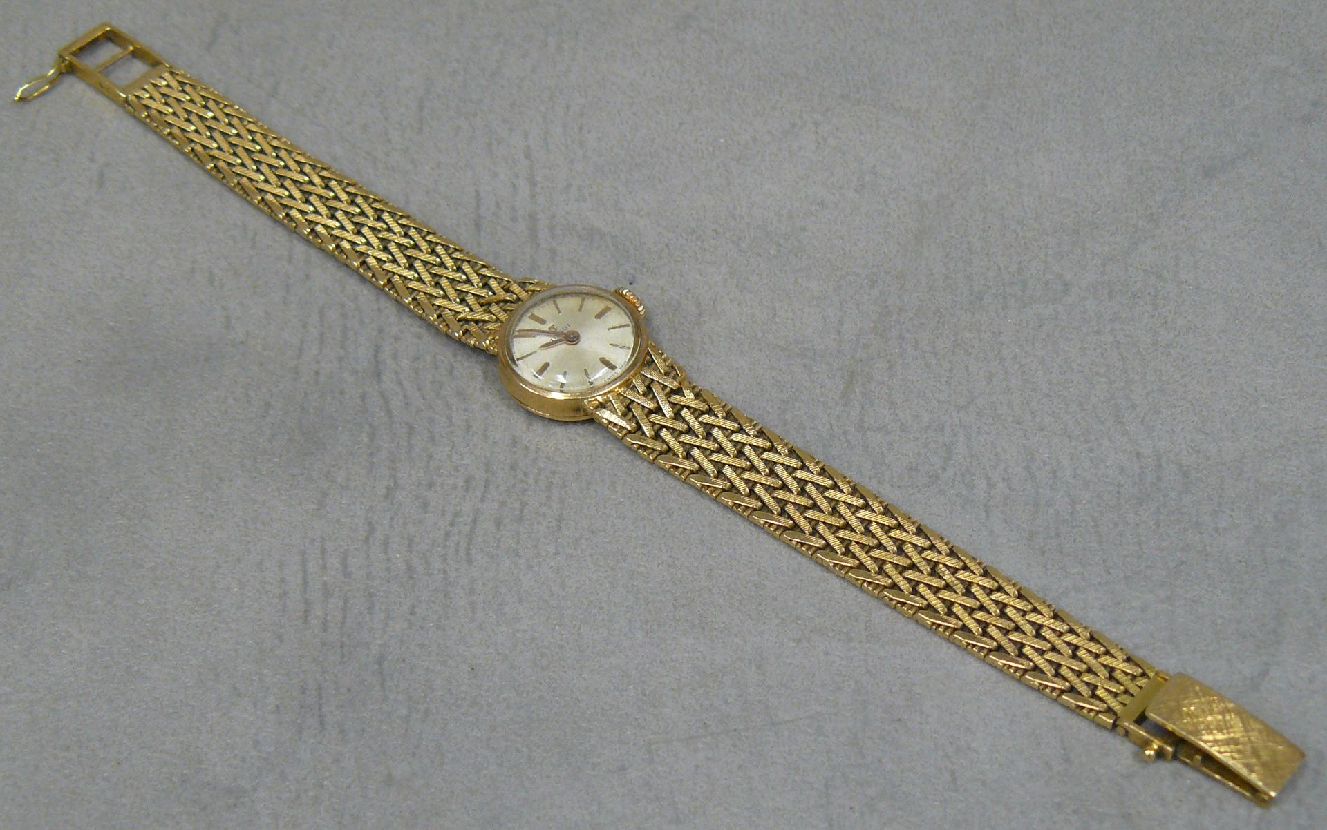 TISSOT 金质表壳（猫头鹰）表盘上签名为天梭的女士手表，金质手镯（老鹰） - Pb 29,55 g