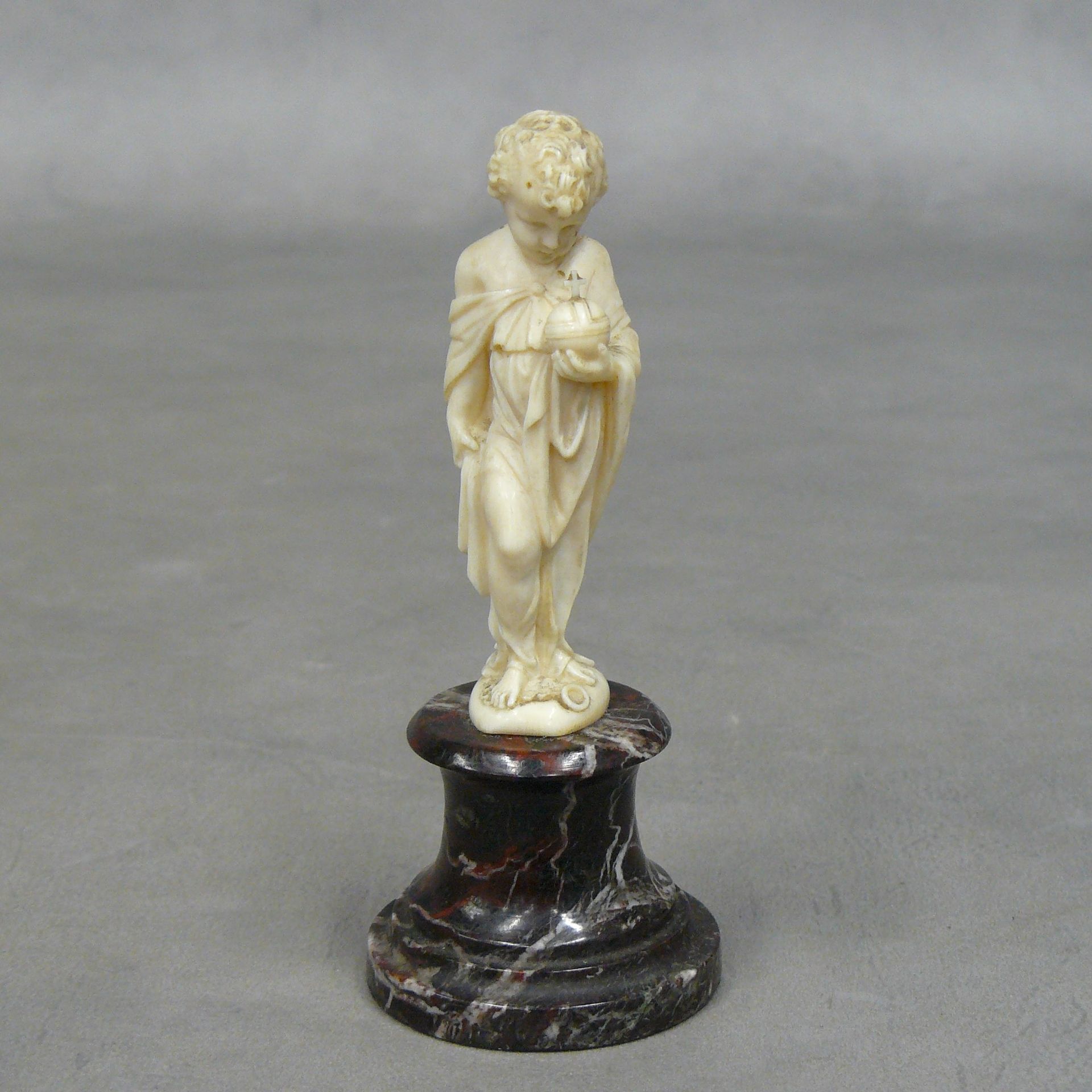 Null 
Small statuette in carved ivory, Child Jesus holding in his left hand the &hellip;