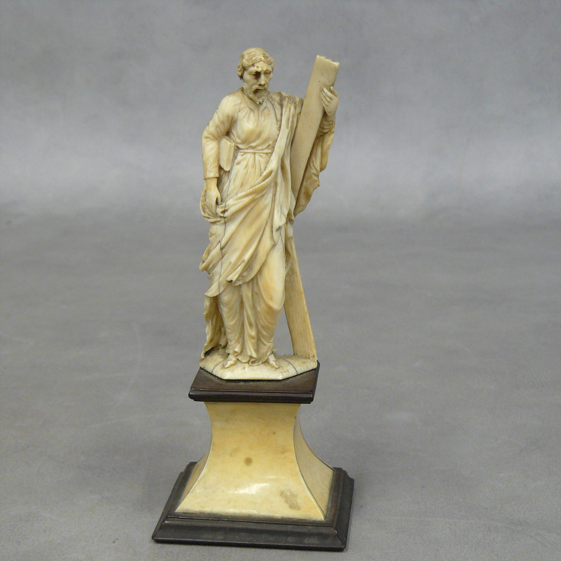 Null 
Ivory statuette, representing Saint Andrew leaning on a cross (small lack)&hellip;