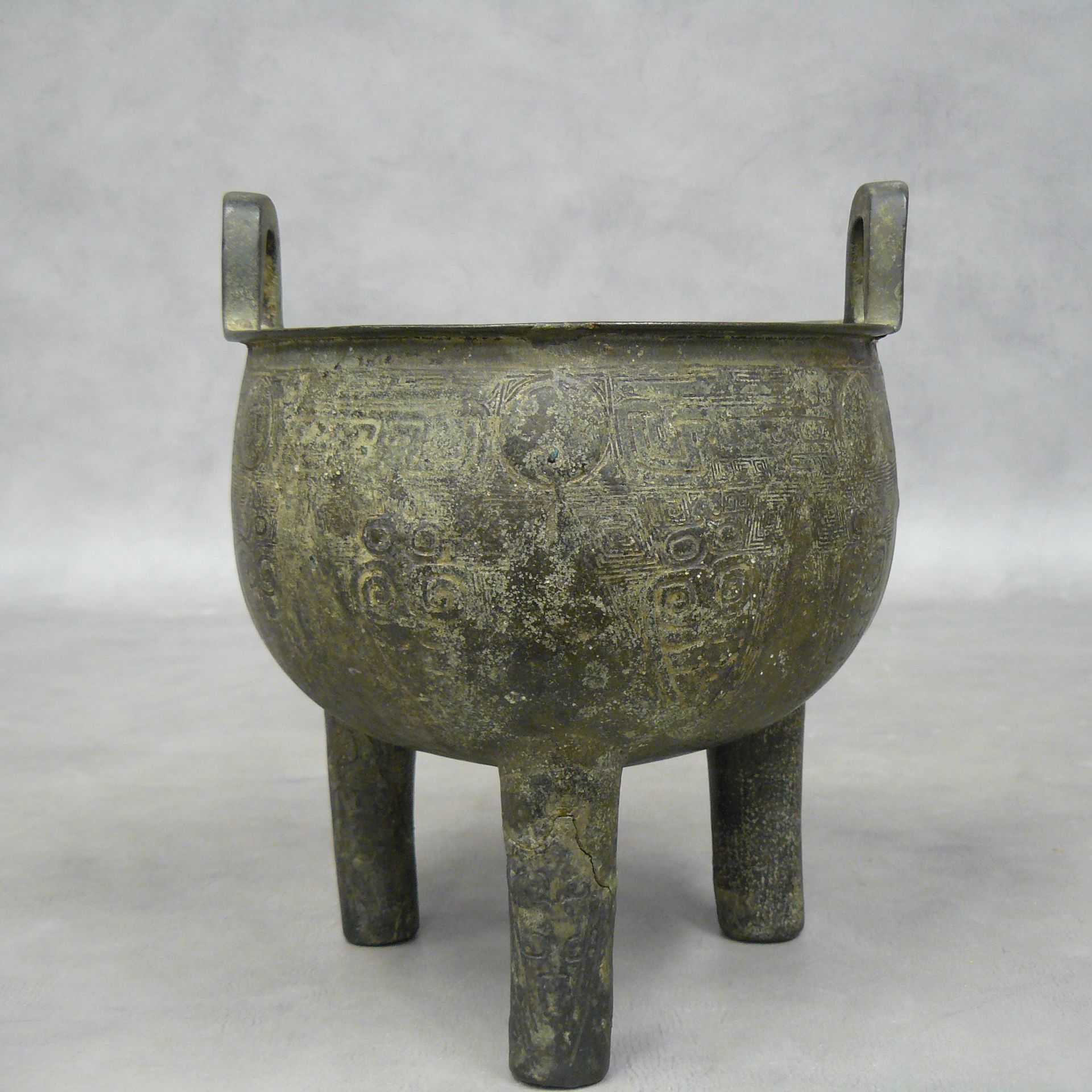 Null 
China: tripod bronze ritual vase of ding shape, used for cooking food. The&hellip;