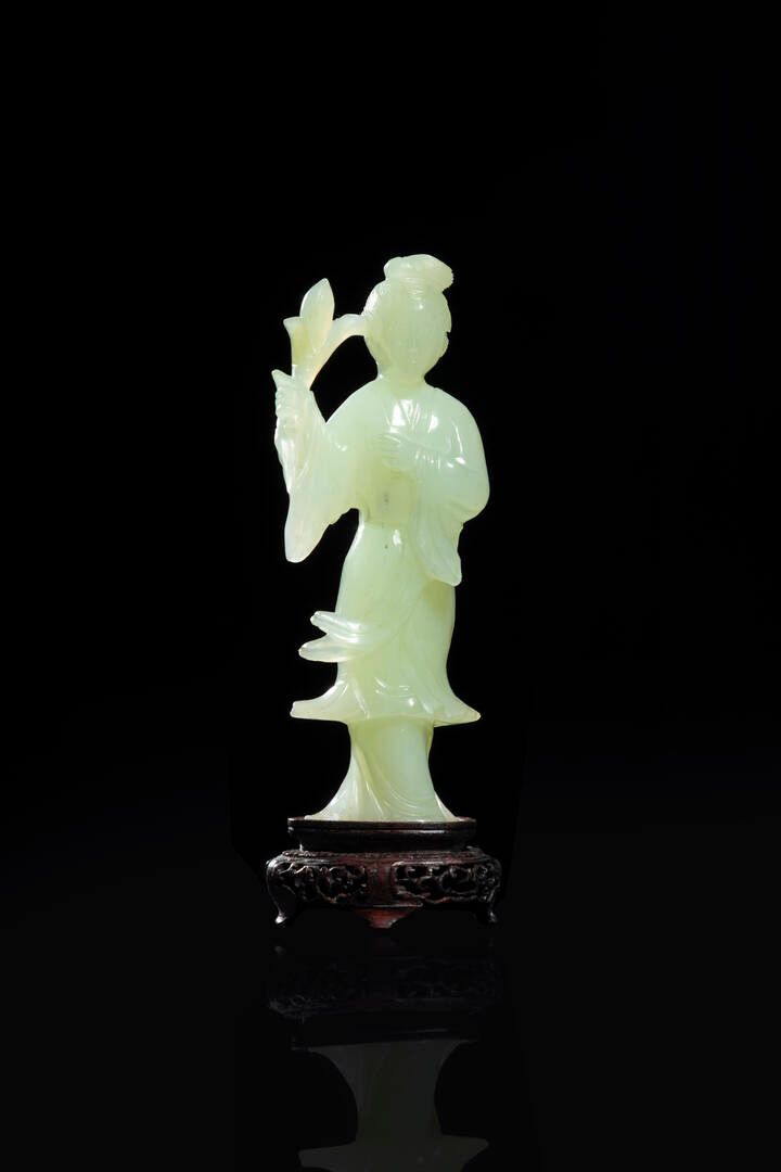 GUANYIN GUANYIN
Guanyin figure in jadeite on wooden base, China, Republic, 20th &hellip;