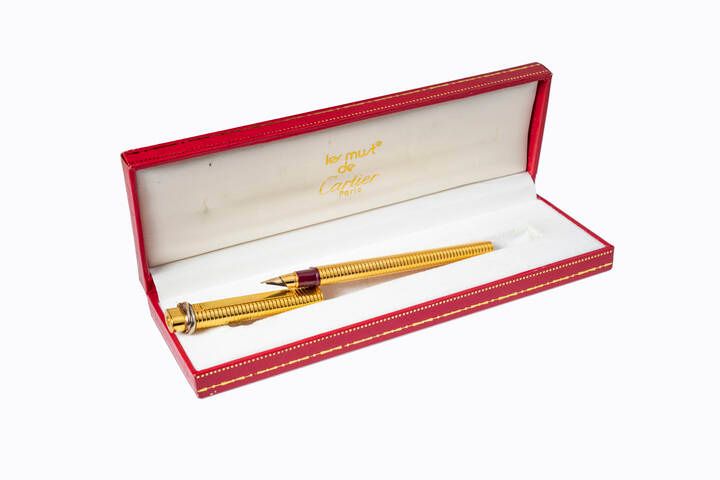 CARTIER CARTIER
"Cartier" fountain pen, laminated body and cap. Three interlaced&hellip;