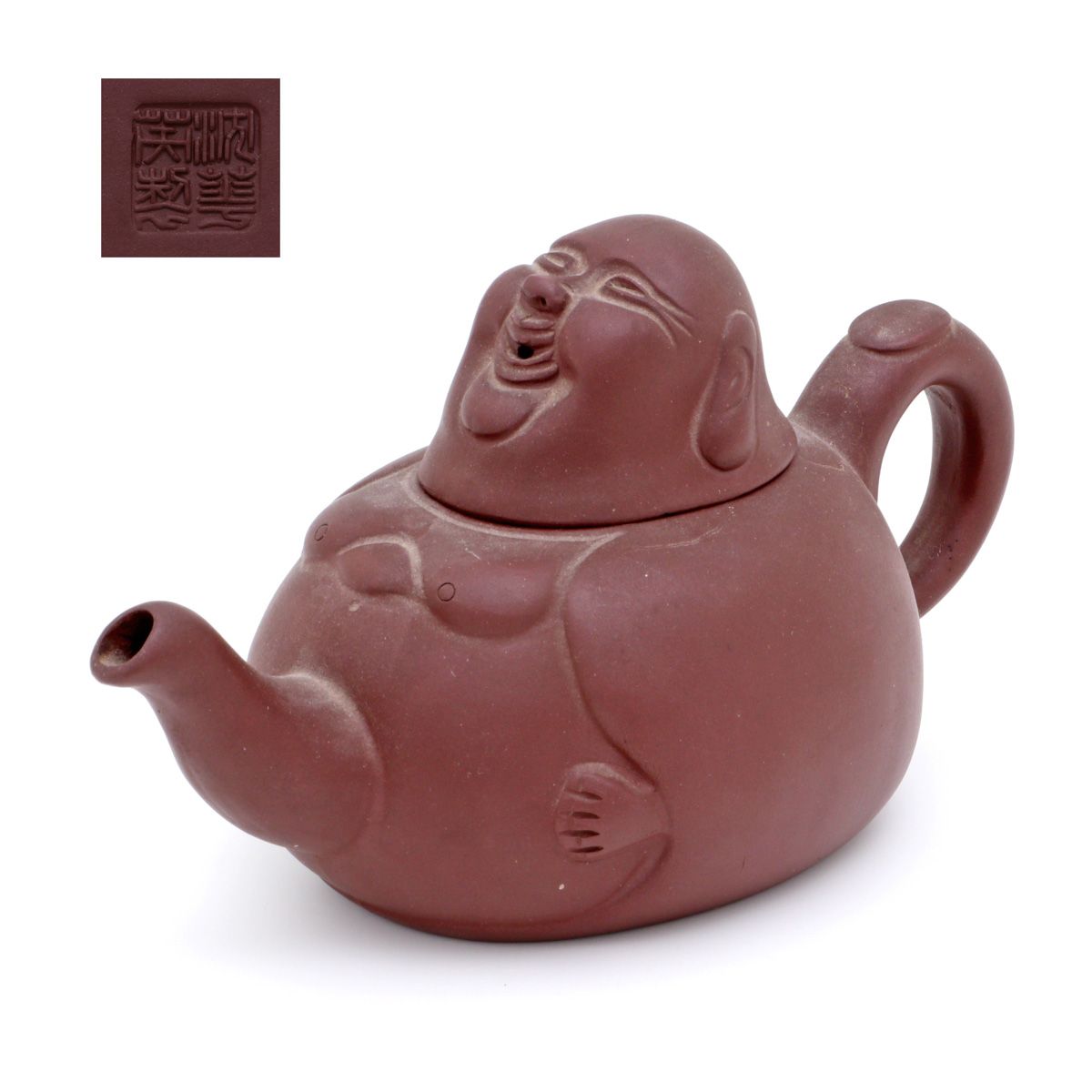 A Yixing teapot A YIXING TEAPOT Chinese terracotta, decoration depicting Buddha.&hellip;
