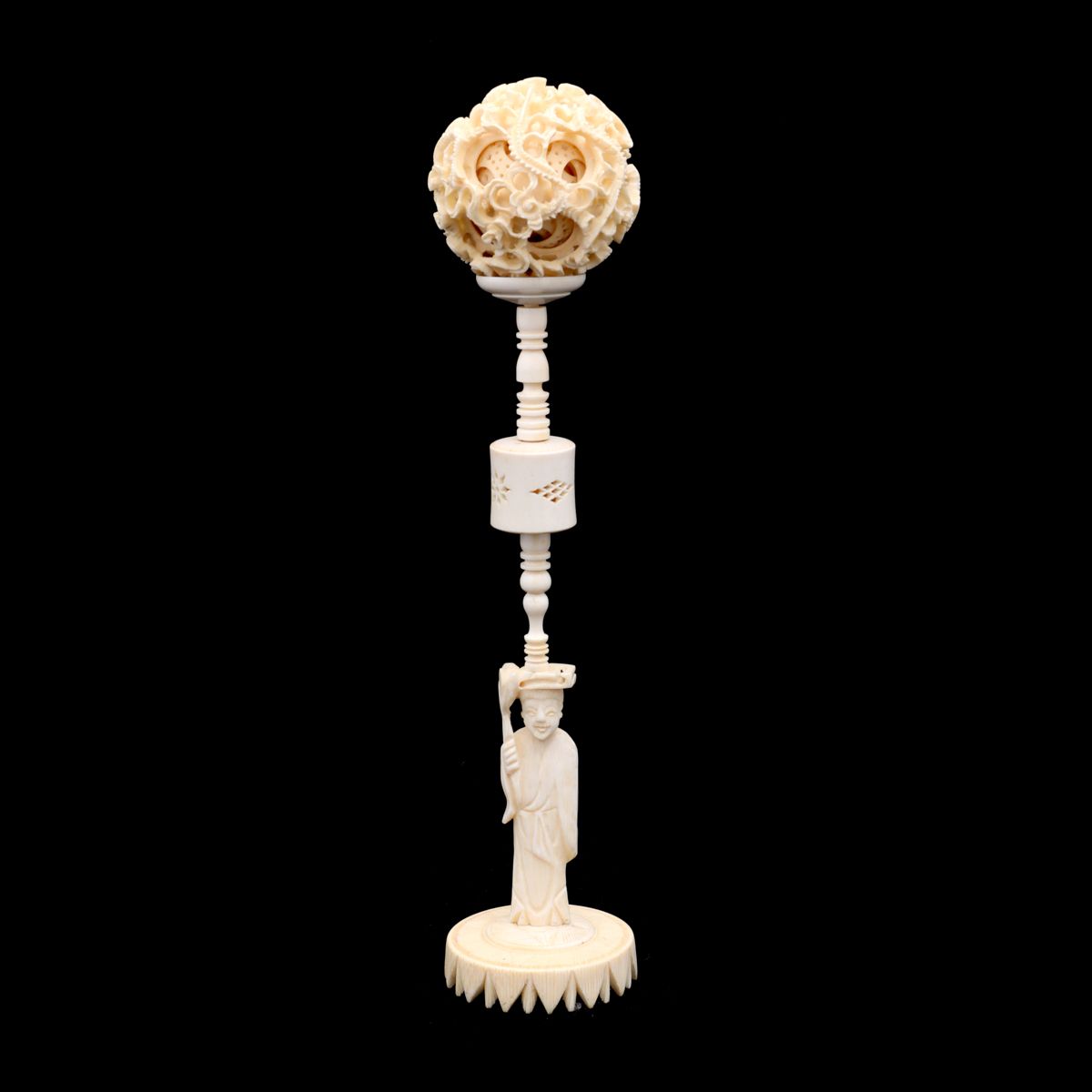 A PUZZLE BALL A PUZZLE BALL Large dimensions, ivory, stand shaped like Oriental &hellip;