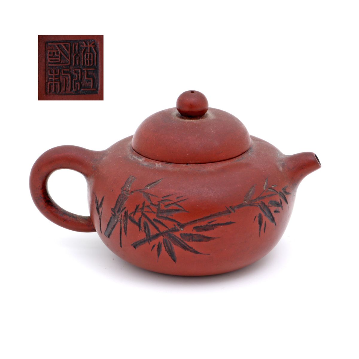 A Yixing teapot A YIXING TEAPOT Chinese terracotta, decoration depicting bamboo &hellip;