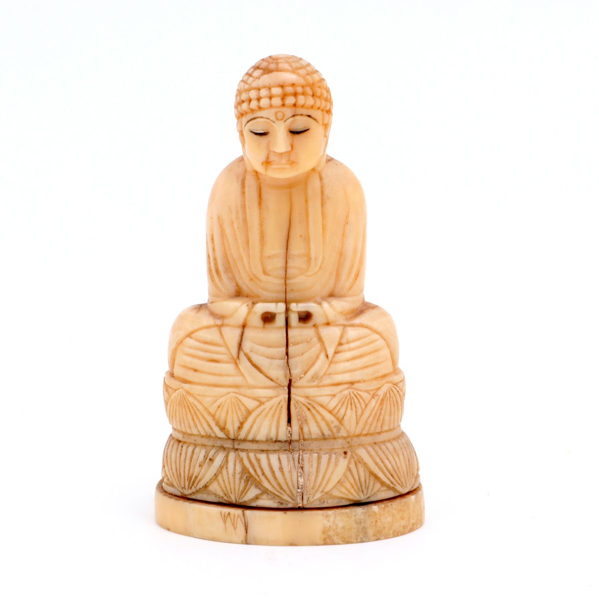 A BUDDHA A BUDDHA Ivory sculpture, base shaped like a lotus flower, engraved eye&hellip;