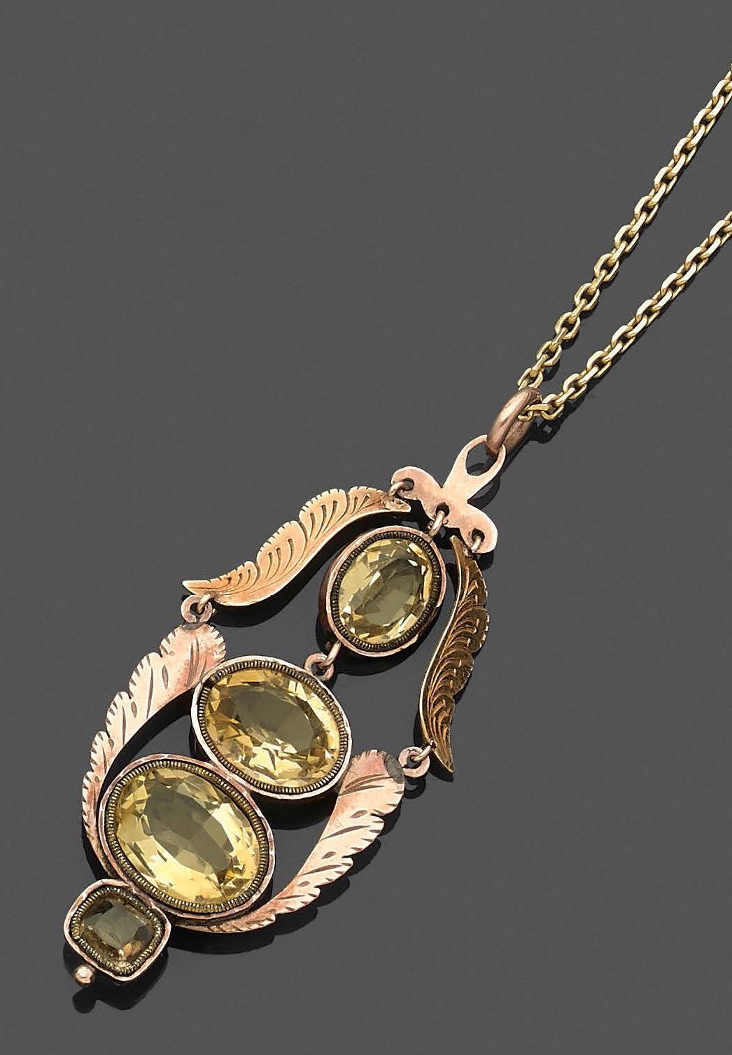 Null A 14-carat pink gold (585‰), openwork, chased, "volutes" pendant set with a&hellip;