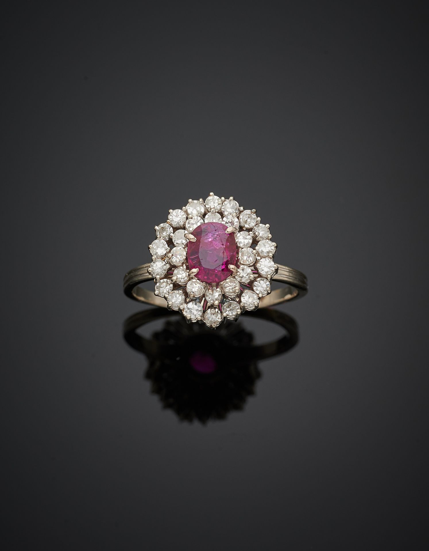 Null White gold (750‰) "pompadour" ring set with an oval-shaped ruby (chips), in&hellip;