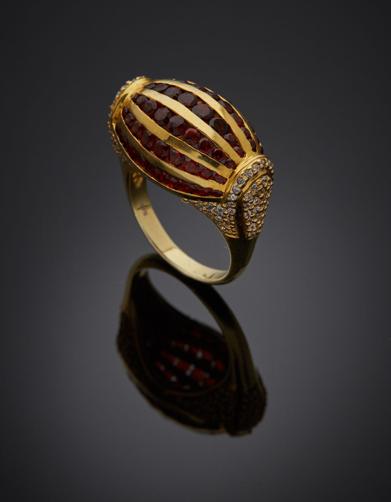 Null Vermeil (925‰) "barrel" ring set with alignments of falling round garnets, &hellip;