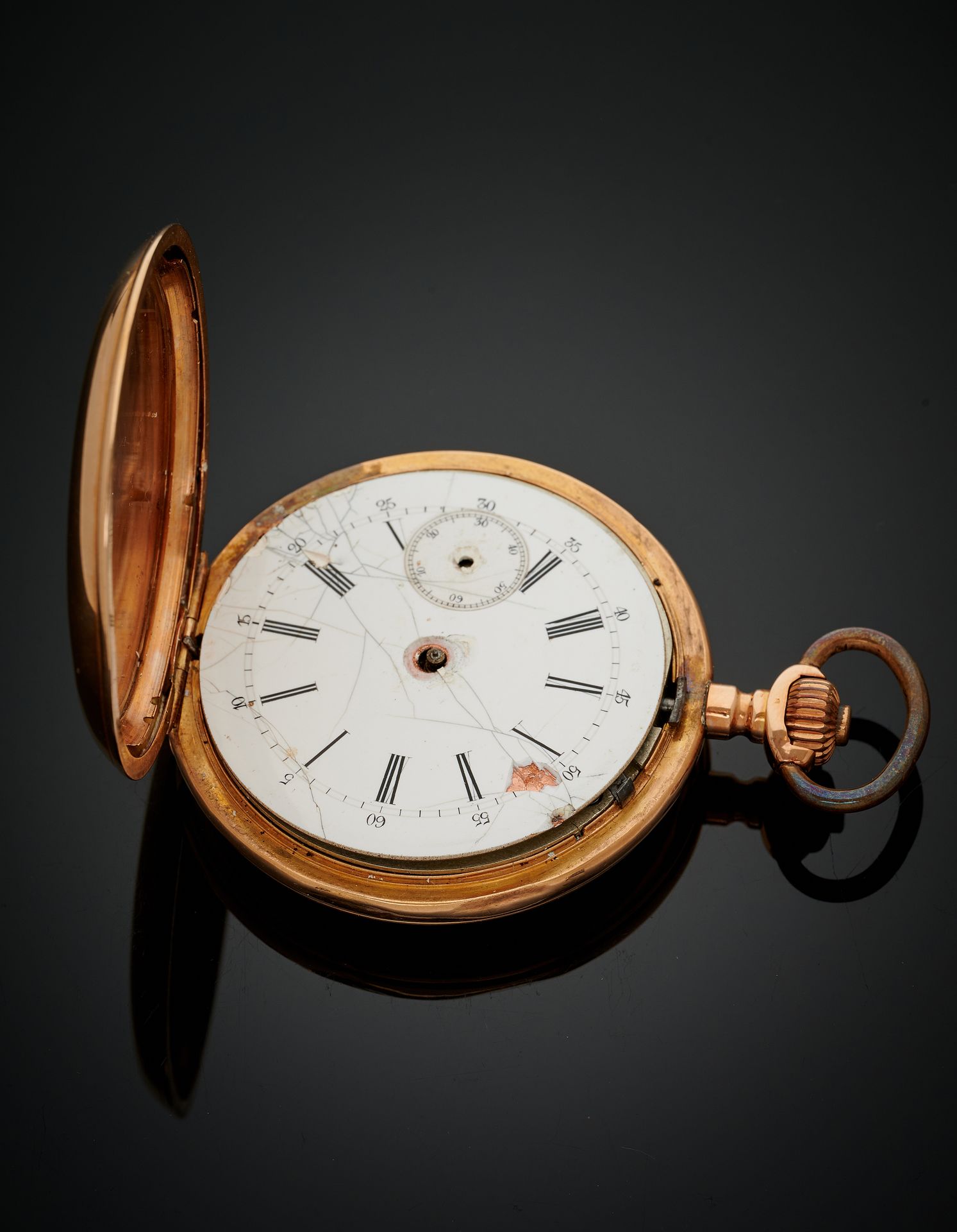 Null 重要的玫瑰金（750‰）SAVONNETTE袖珍手表。白色珐琅表盘，阿拉伯数字和罗马数字（裂缝消失）。金属搭扣。众多的事故和丢失的零件。
约1900年&hellip;