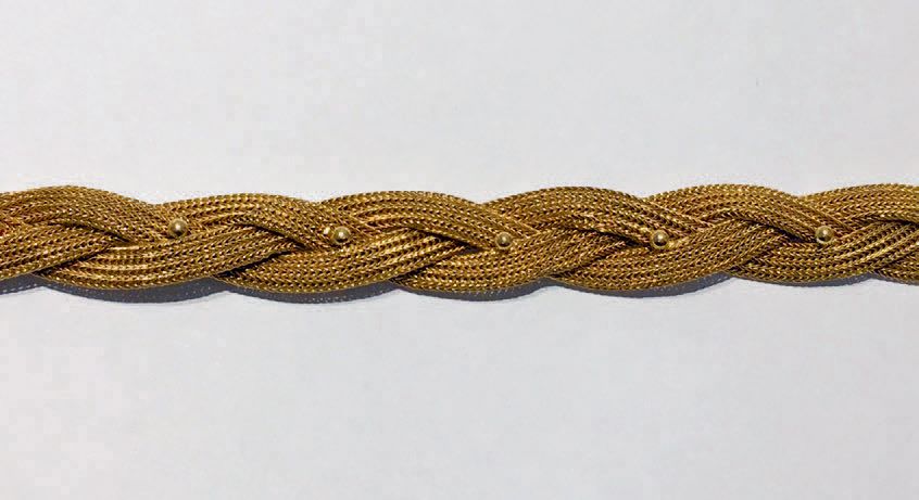Null BRACELET tressé et boulé en or jaune (750 millièmes).
Longueur: 18,5 cm
Poi&hellip;