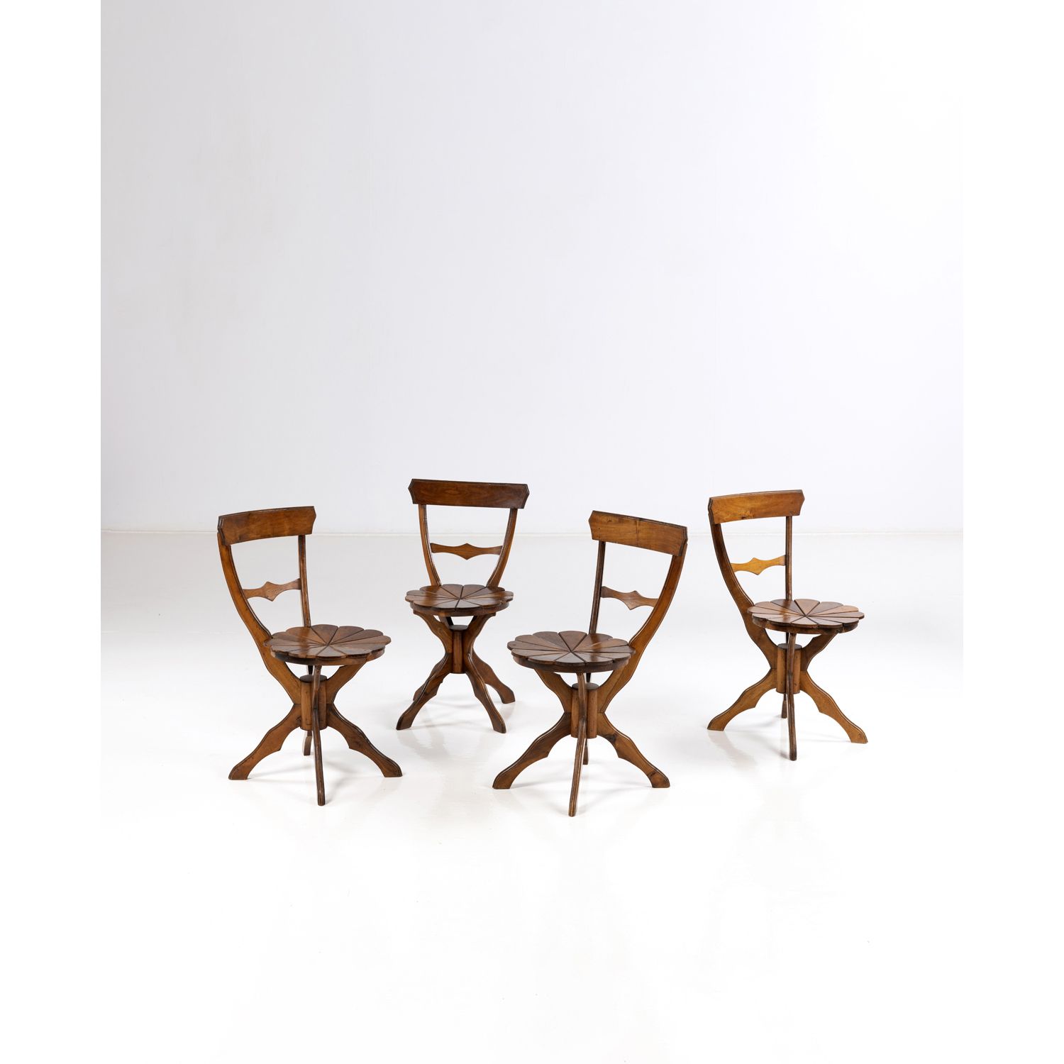 Null Foreign production (20th c.)

Set of four chairs, circa 1900

Tinted wood

&hellip;