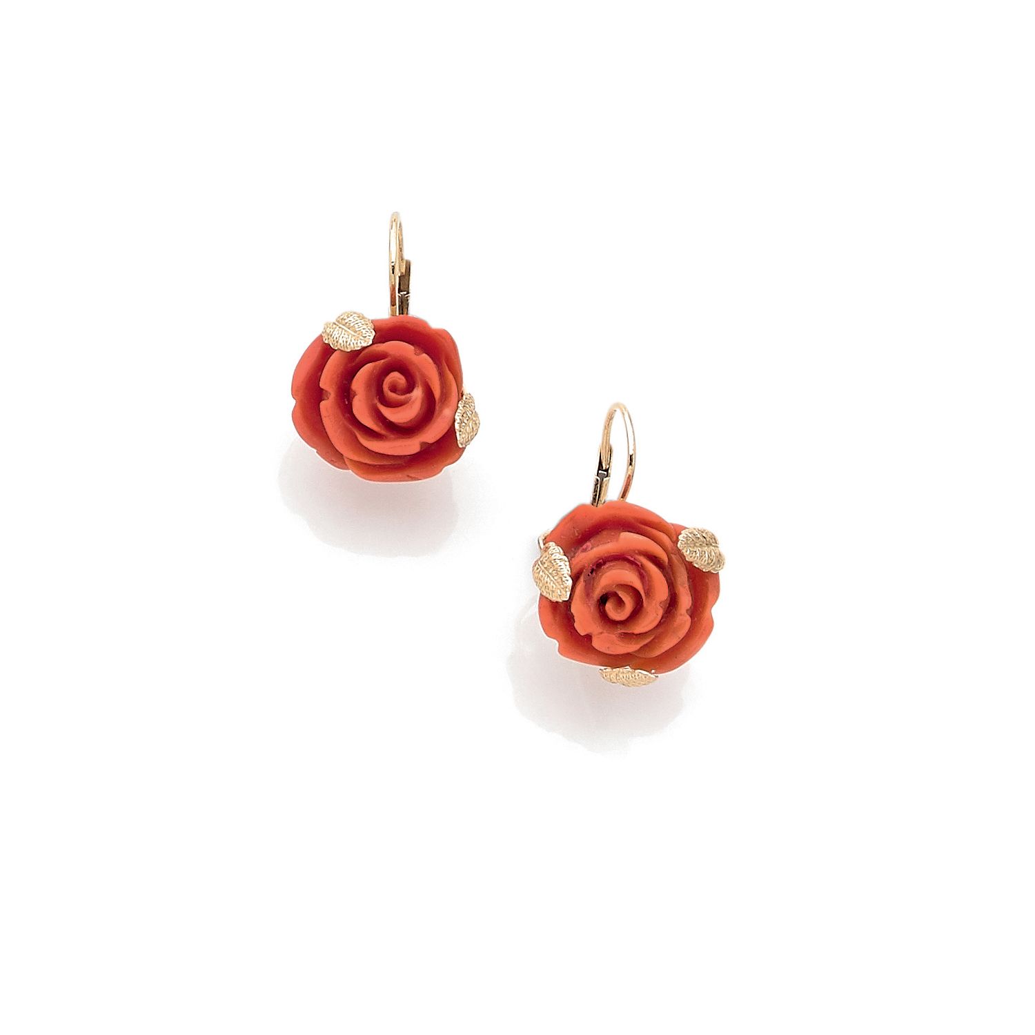 Null Pair of "dormeuses" earrings in 18K yellow gold

(750‰) with coral carved i&hellip;