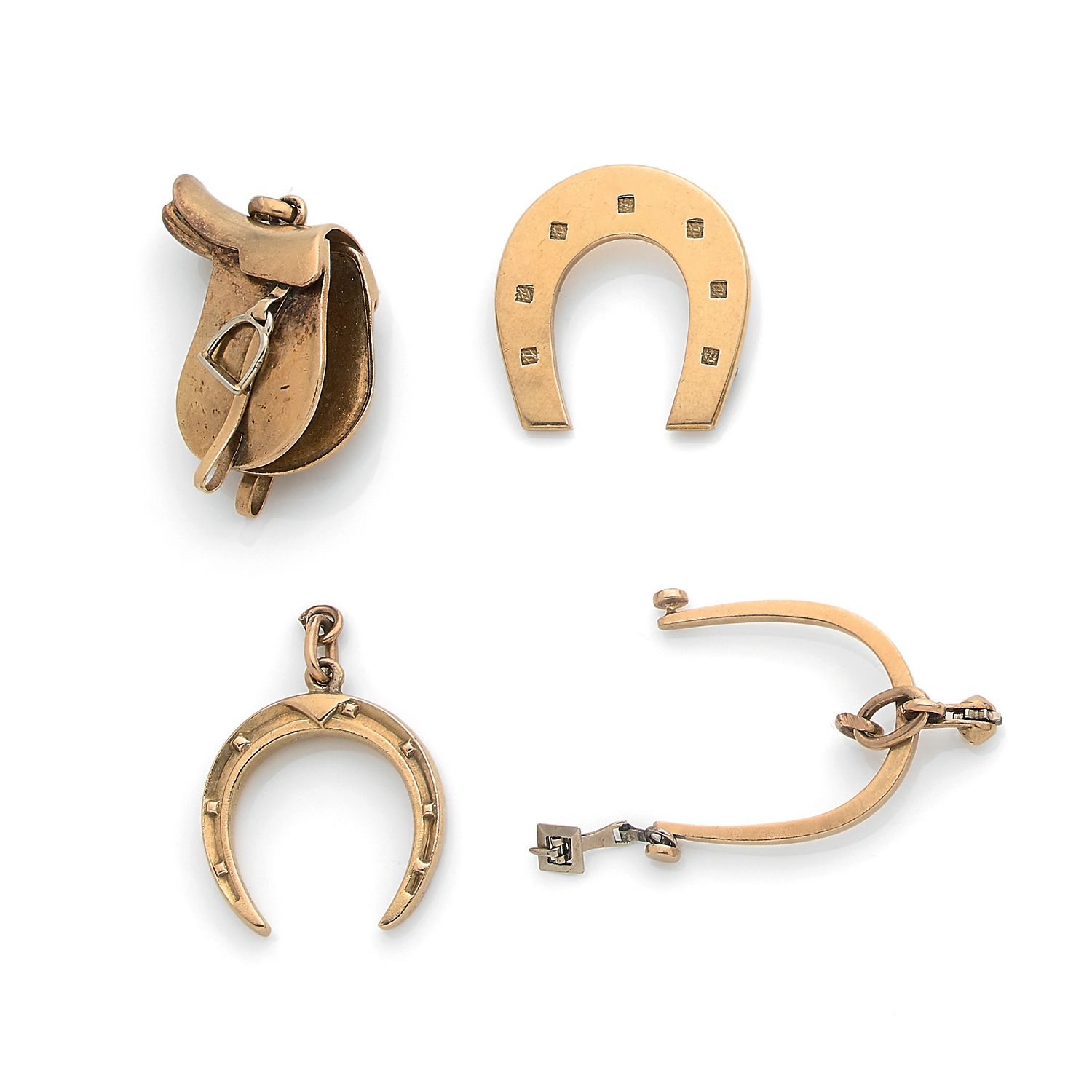 Null Set of three charms on the theme of horse-riding in

18K yellow gold (750‰)&hellip;