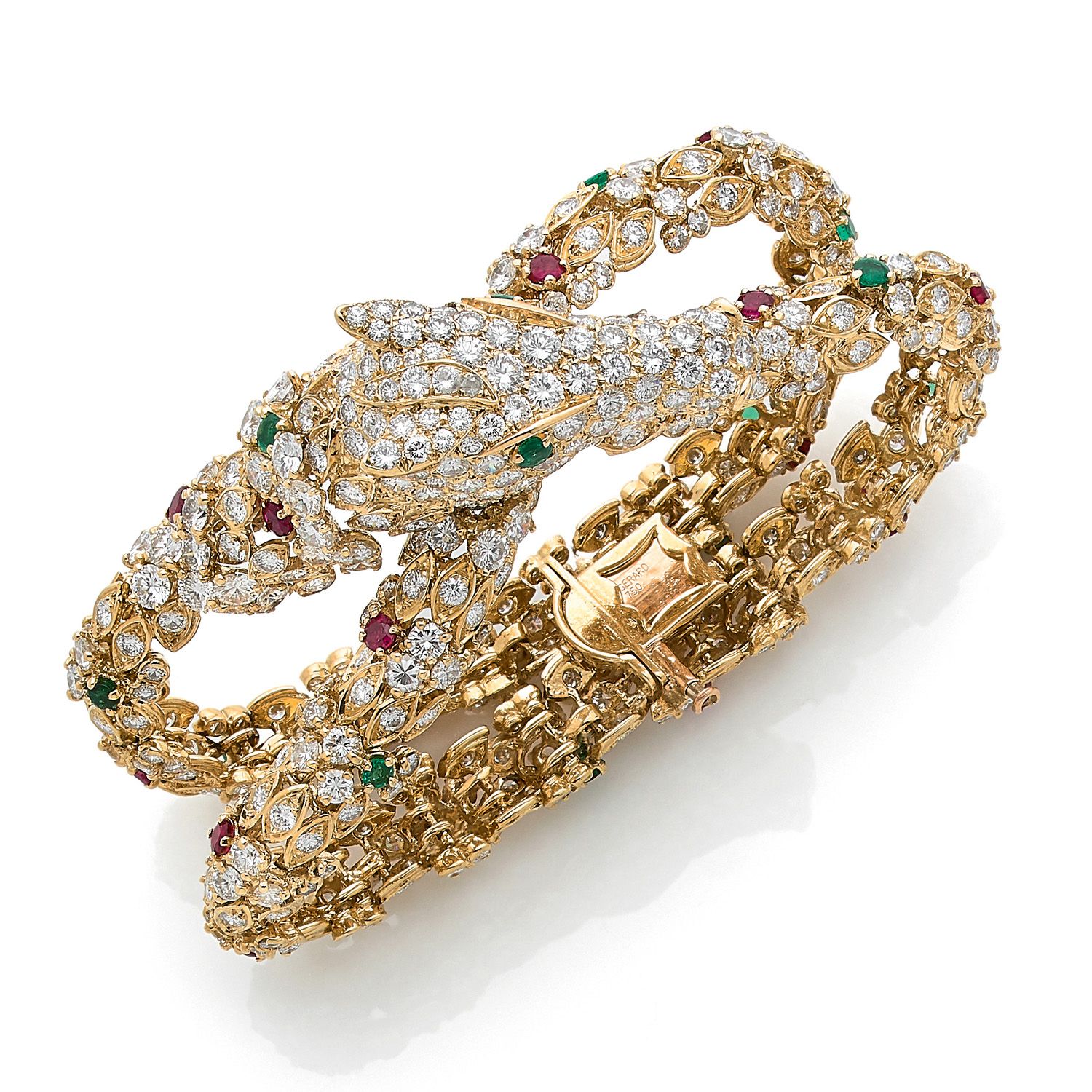 Null °GERARD，巴黎

1975-80年

马 "图案

18K黄金（750‰）铰链式手镯，由两条由马头连接的丝带组成

镶嵌有钻石、红宝石和圆形祖母&hellip;