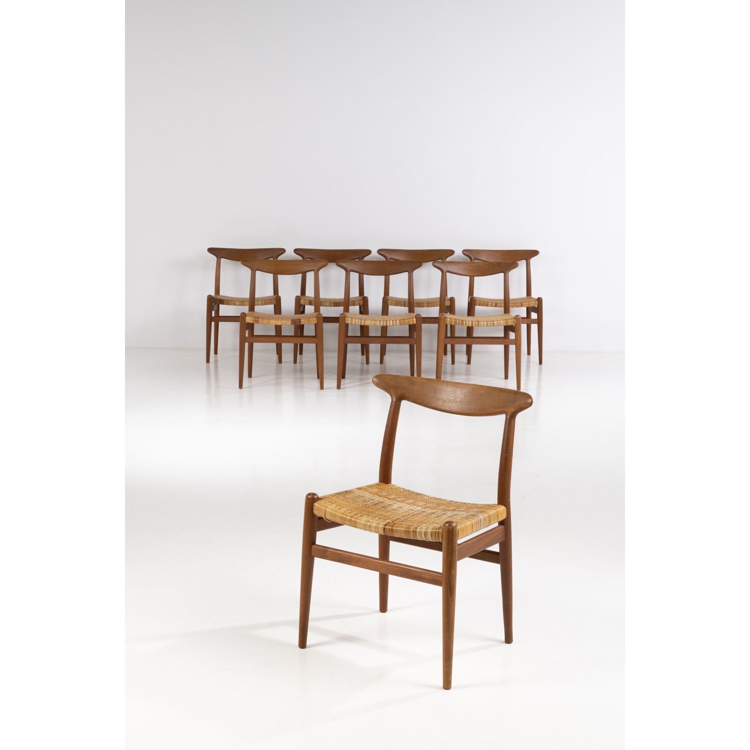Null Hans J. Wegner (1914-2007)

Set of eight chairs

Teak and caning

Edited by&hellip;