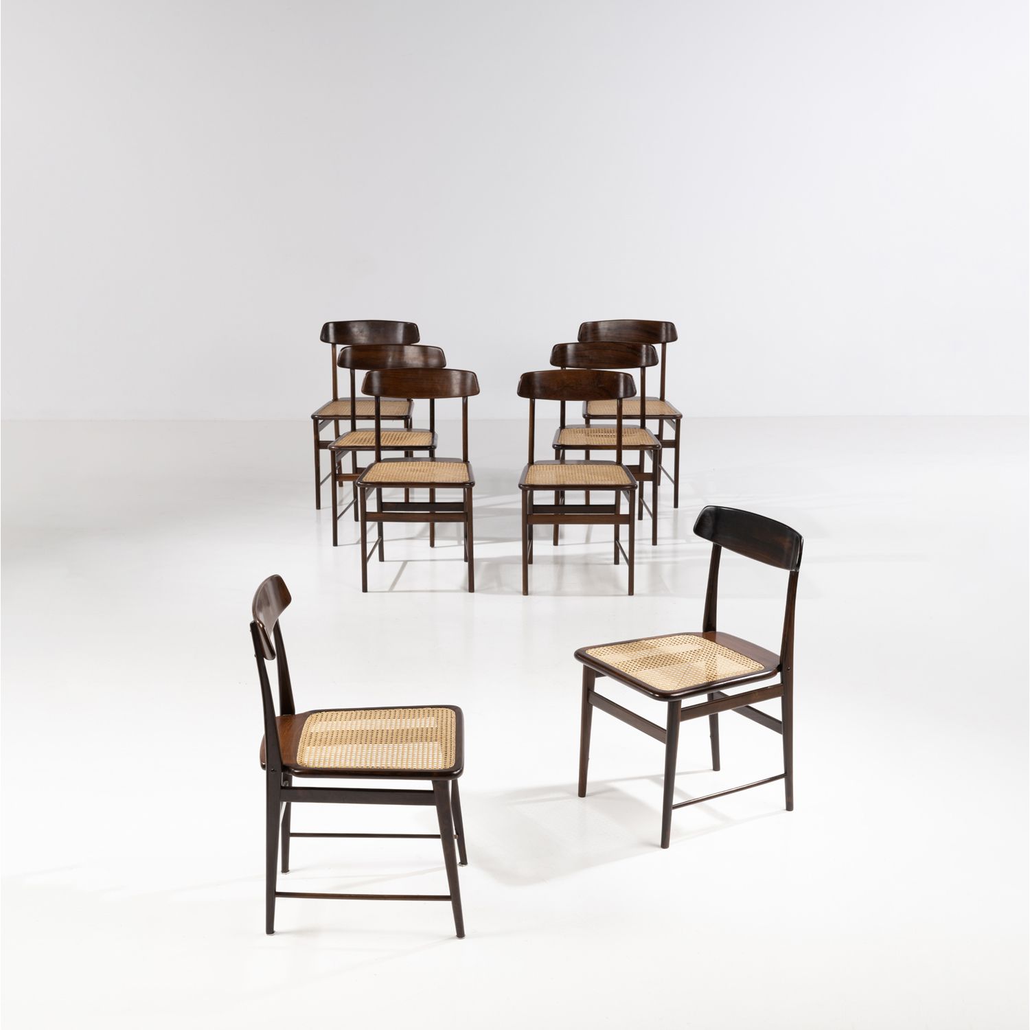 Null Sergio Rodrigues (1927-2014)

Cadeira Lucio Costa

Set of eight chairs

Imb&hellip;