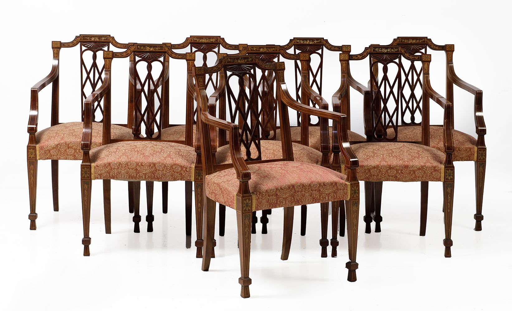 Eight Adam style dining armchairs 一套八张多色木扶手椅，椅背中央有亚当式的镂空雕刻，20世纪。一条手臂没有挂起来。尺寸：97 &hellip;