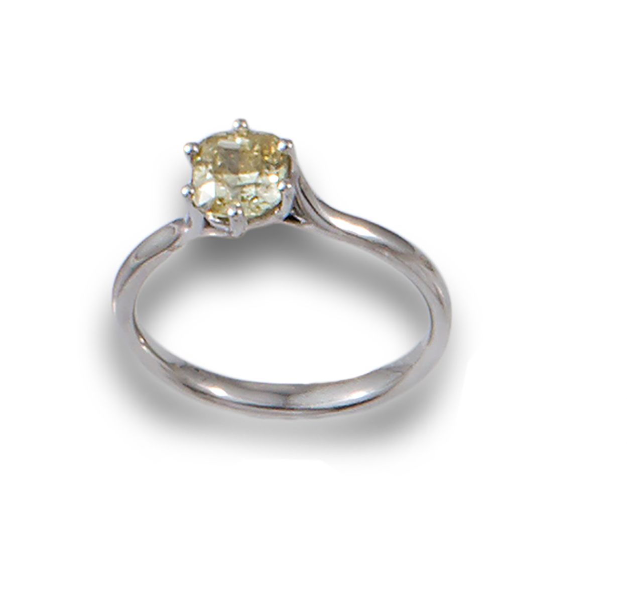 SOLITAIRE CUSHION CUT CHAMPAGNE 0.75 Solitaire ring in 14 kt. White gold, compri&hellip;