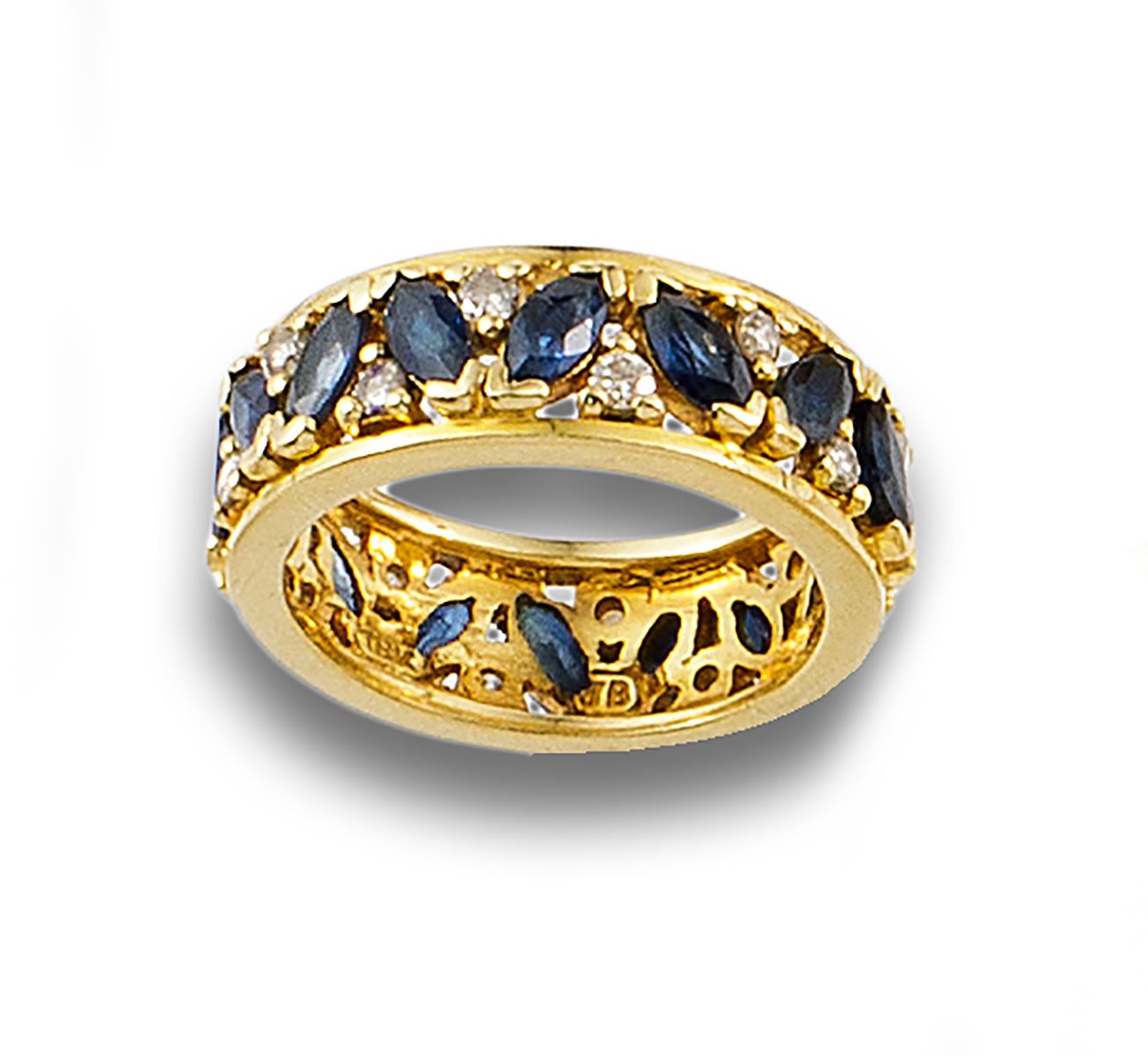 Wide endless ring in 18 kt yellow gold. Formé par la conception de saphirs, tail&hellip;