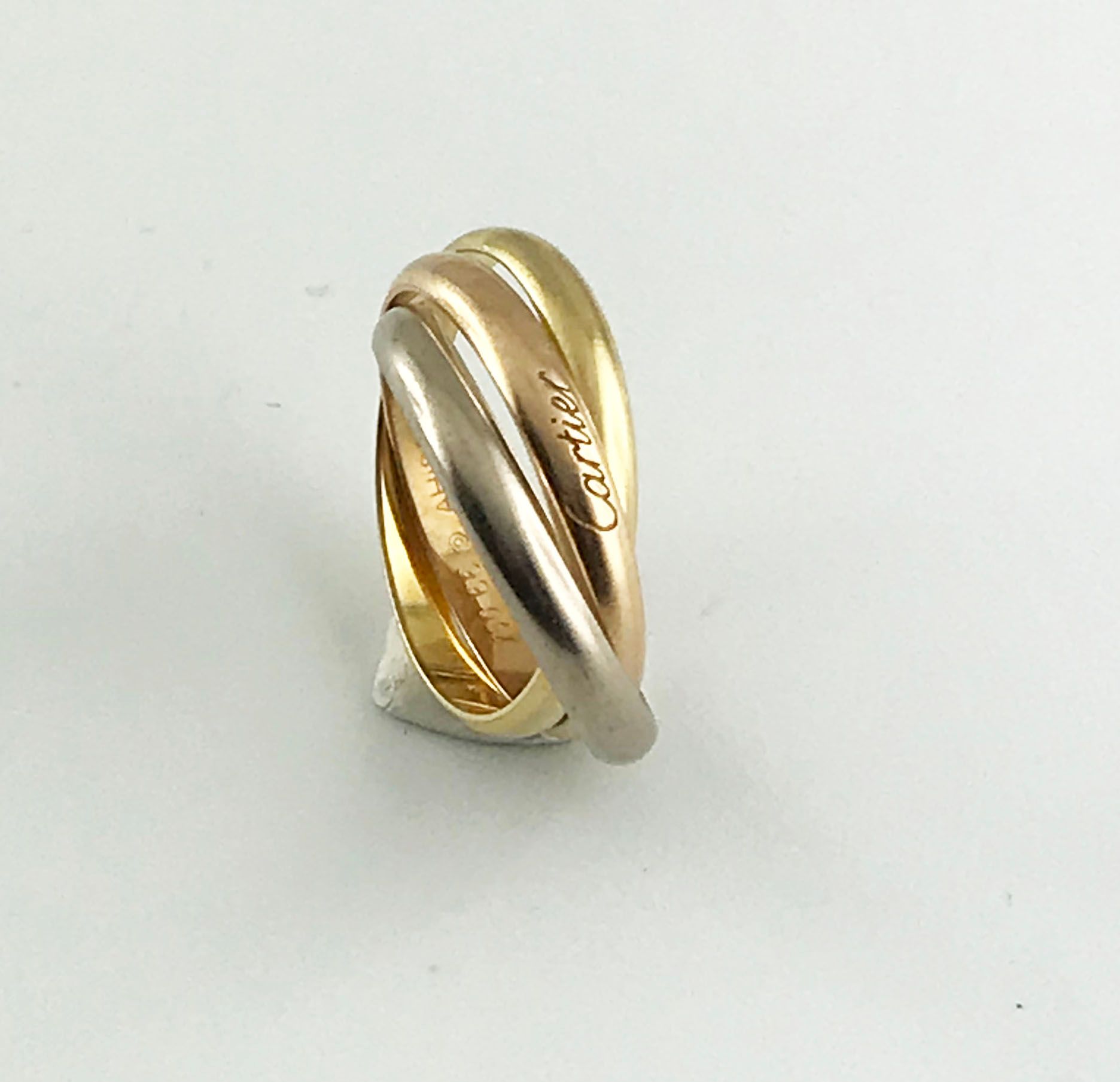 Null 卡地亚，三位一体黄金750°/°结婚戒指，手指尺寸66，签名和编号，重量：13克