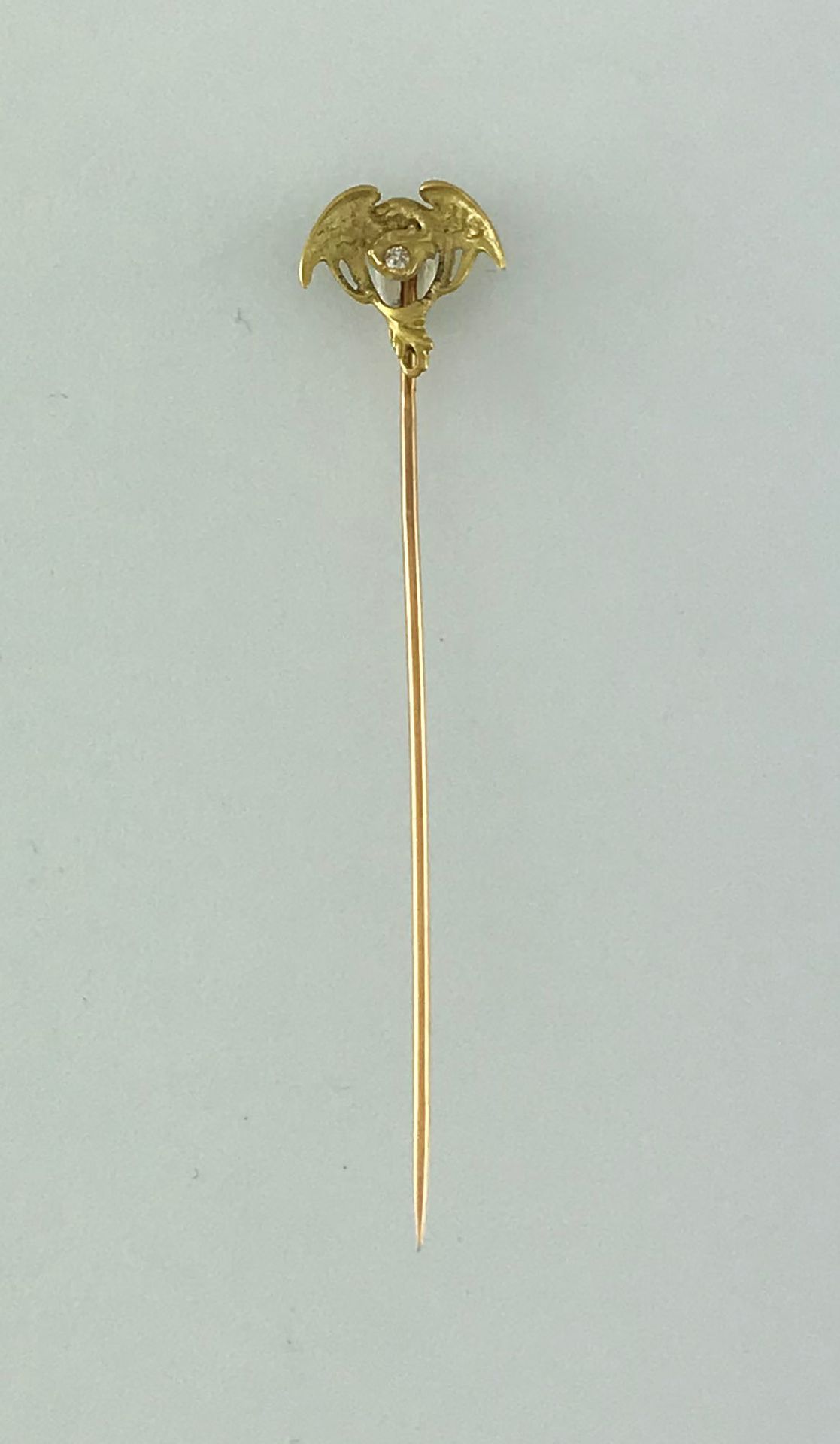 Null Epingle de cravate chimère en or 750°/°°sertie d'un diamant TA, Circa 1900,&hellip;