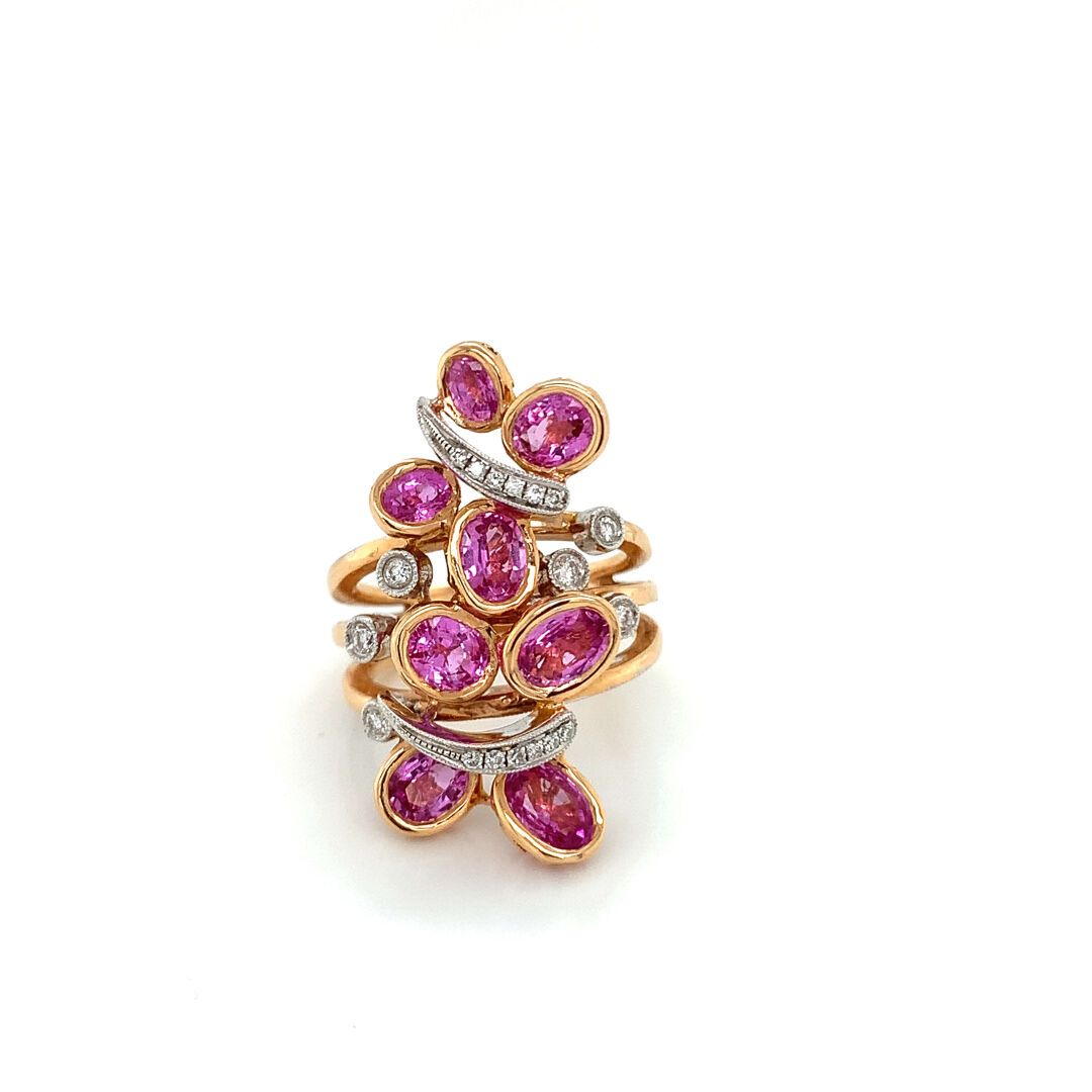 BAGUE en or rose, saphirs roses et diamants Pink gold ring (750‰) forming two bu&hellip;