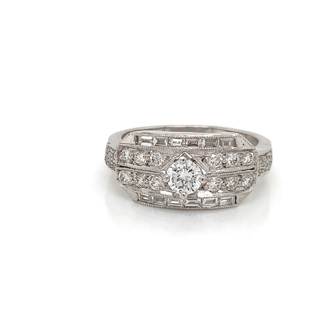 BAGUE en or gris et diamants 白金戒指(750‰)，镶嵌小型明亮型和长方形钻石。
毛重：6.18克。手指尺寸：55。