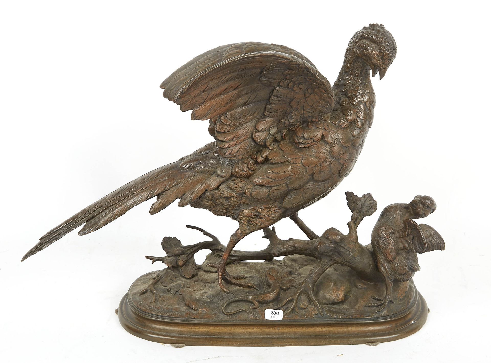 Null DELABRIERE Edouard (1829/1912)。带有棕色铜锈的青铜主题，表现了一只鹧鸪、它的幼崽和一只蝾螈。签名。高度：32厘米。高度：&hellip;
