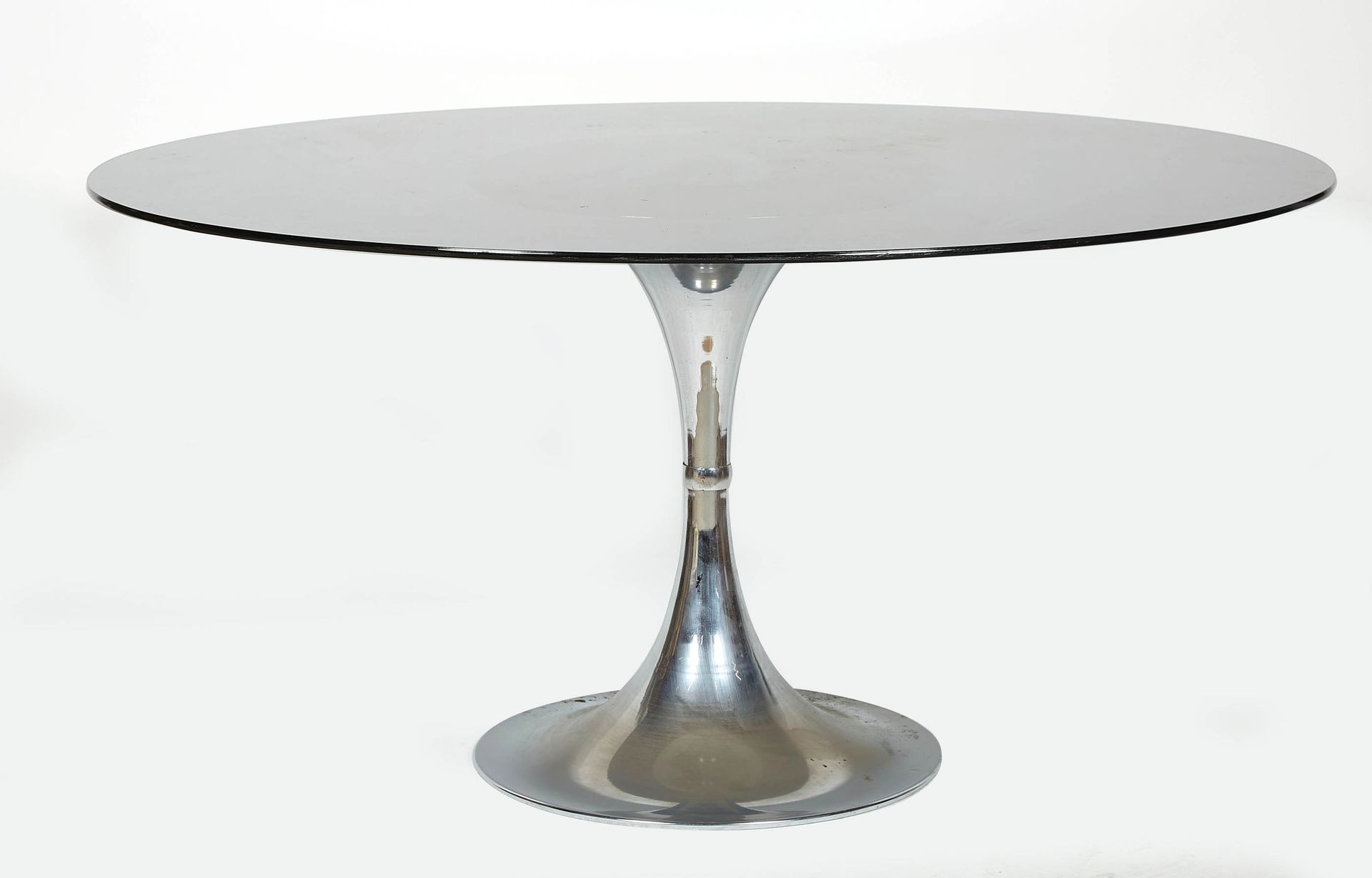 Null Table with chrome "tulip" base and dark oval glass top. Circa 1970. Height &hellip;