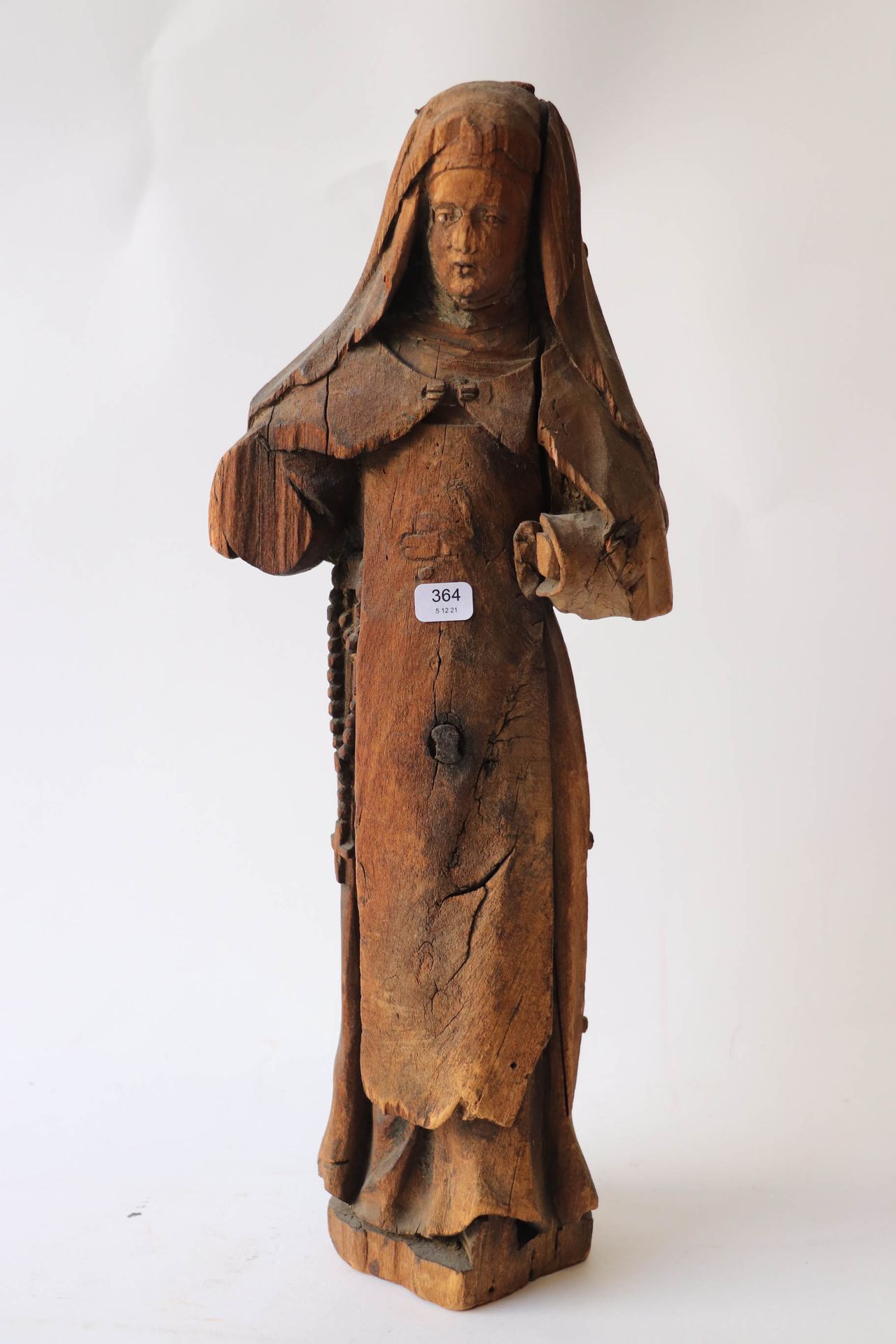 Null 雕刻的圣人木雕。18世纪。高度：40厘米。高度：40厘米。错过了。

小姐 - 40 x 16厘米。