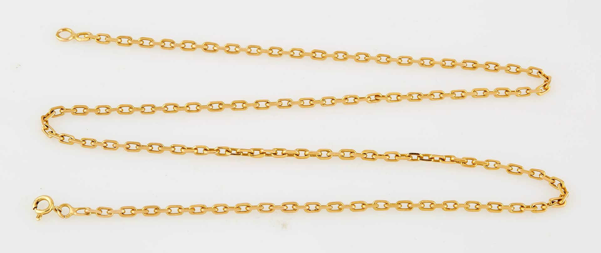 Null Chaine en or jaune maille forçat. Long. : 60,5 cm. Poids : 18,40 g.