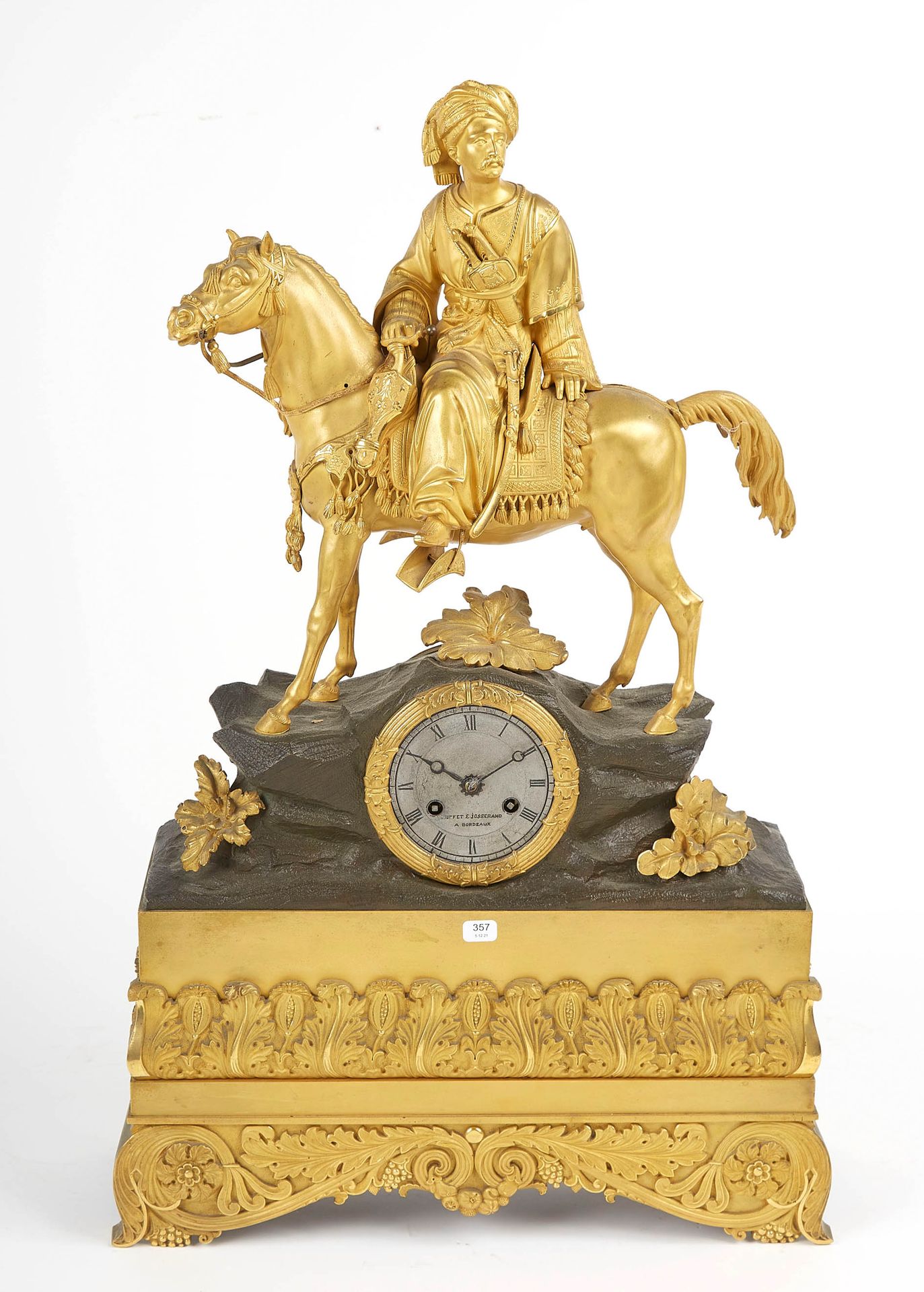 Null Beautiful gilt bronze clock with a black patina. The dial is engraved Buffe&hellip;