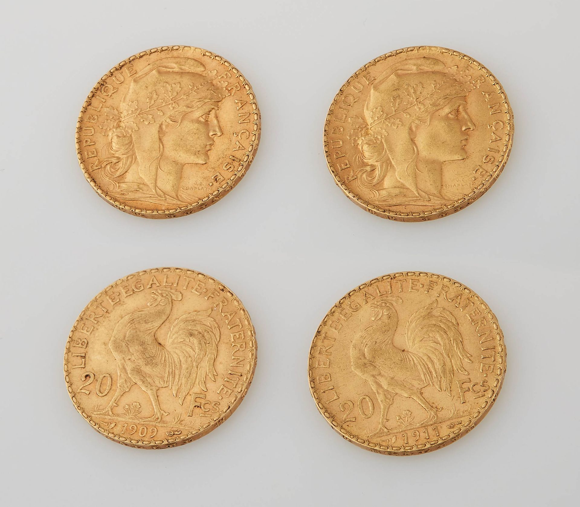 Null Due monete d'oro da 20 franchi 1909 e 1911. Diametro: 2 cm. Peso: 12,89 g.