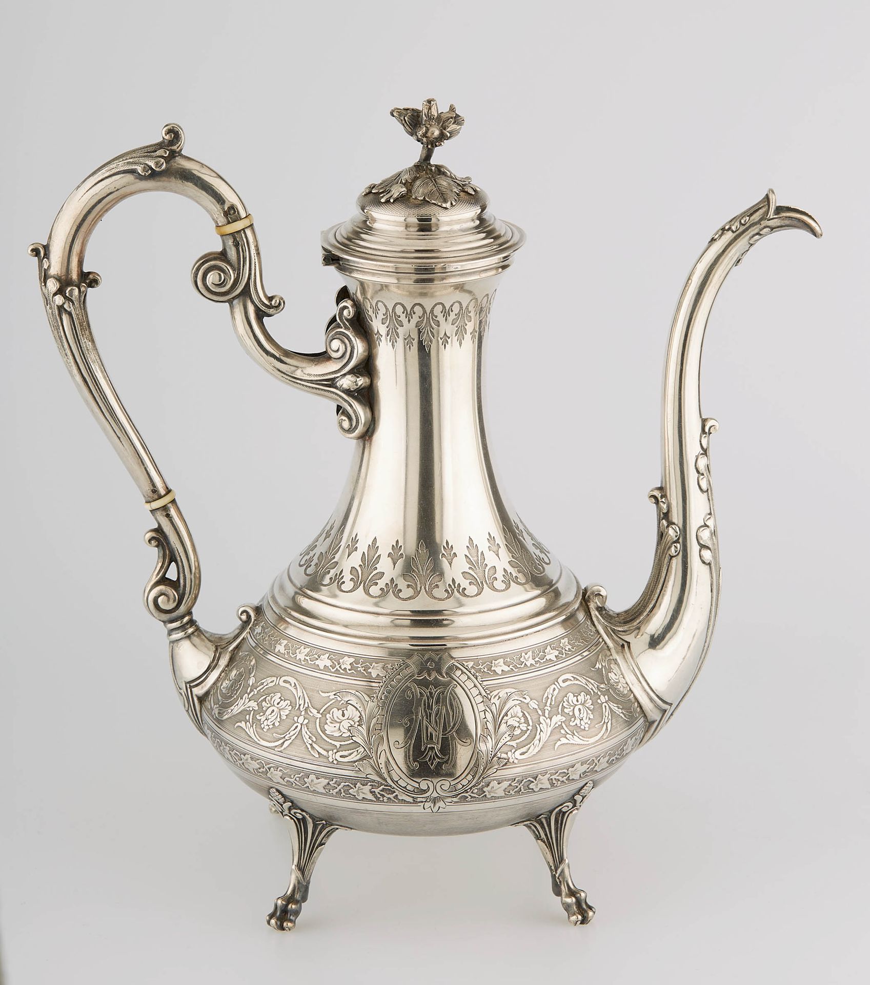 Null Silver coffee pot resting on four claw feet and whose guilloche body is eng&hellip;