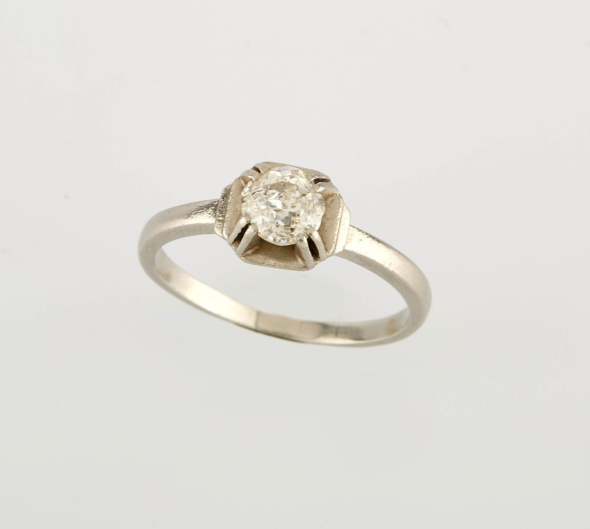 Null Solitaire ring in platinum set with a 0.35 ct old cut diamond.