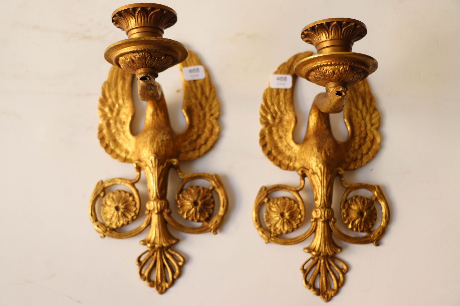 Null A pair of ormolu sconces with one arm of light with a bird with spread wing&hellip;