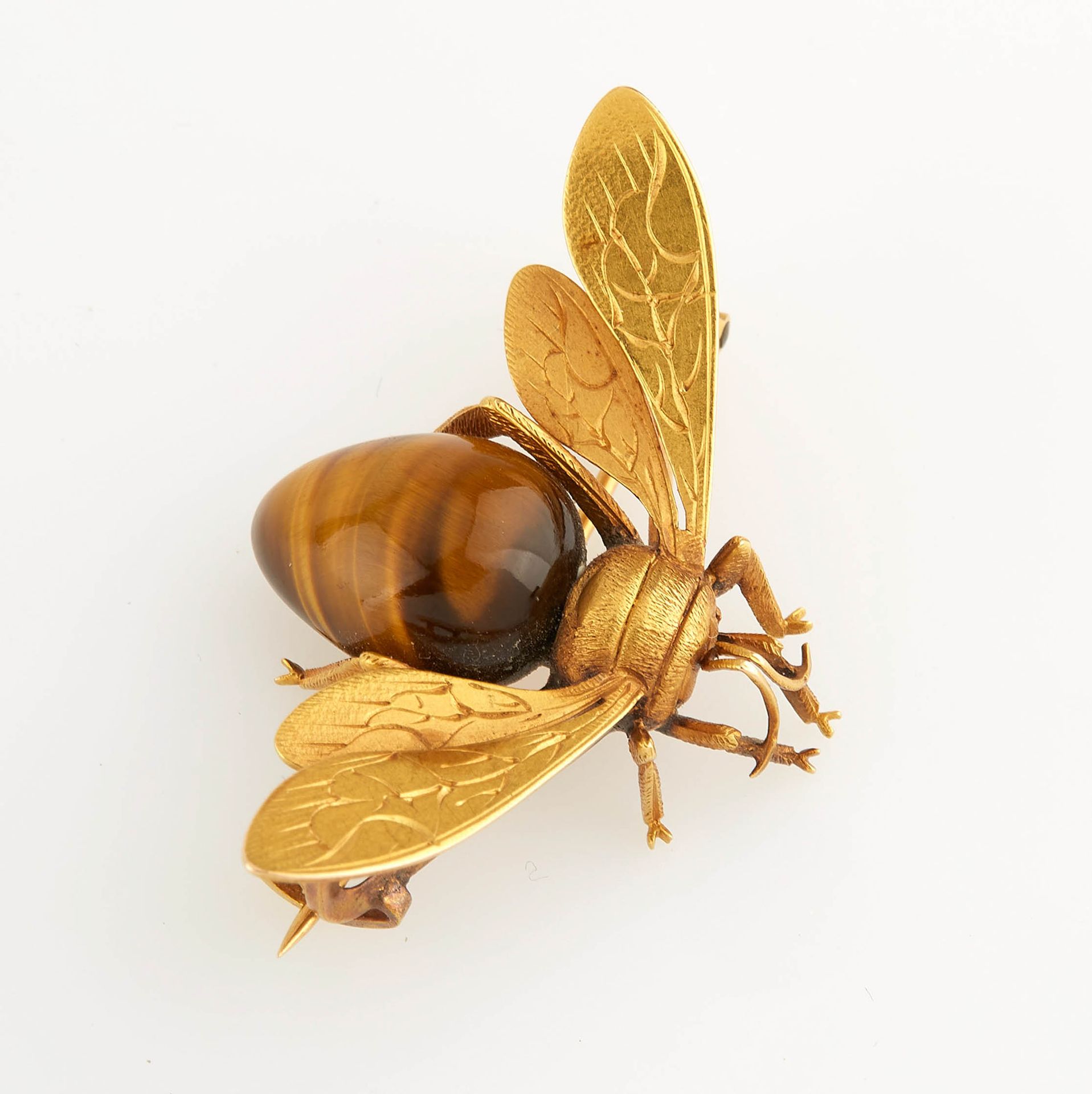 Null 黄金和石英 "虎眼 "胸针，形状是一只蜜蜂。重量（毛重）：8.90克。