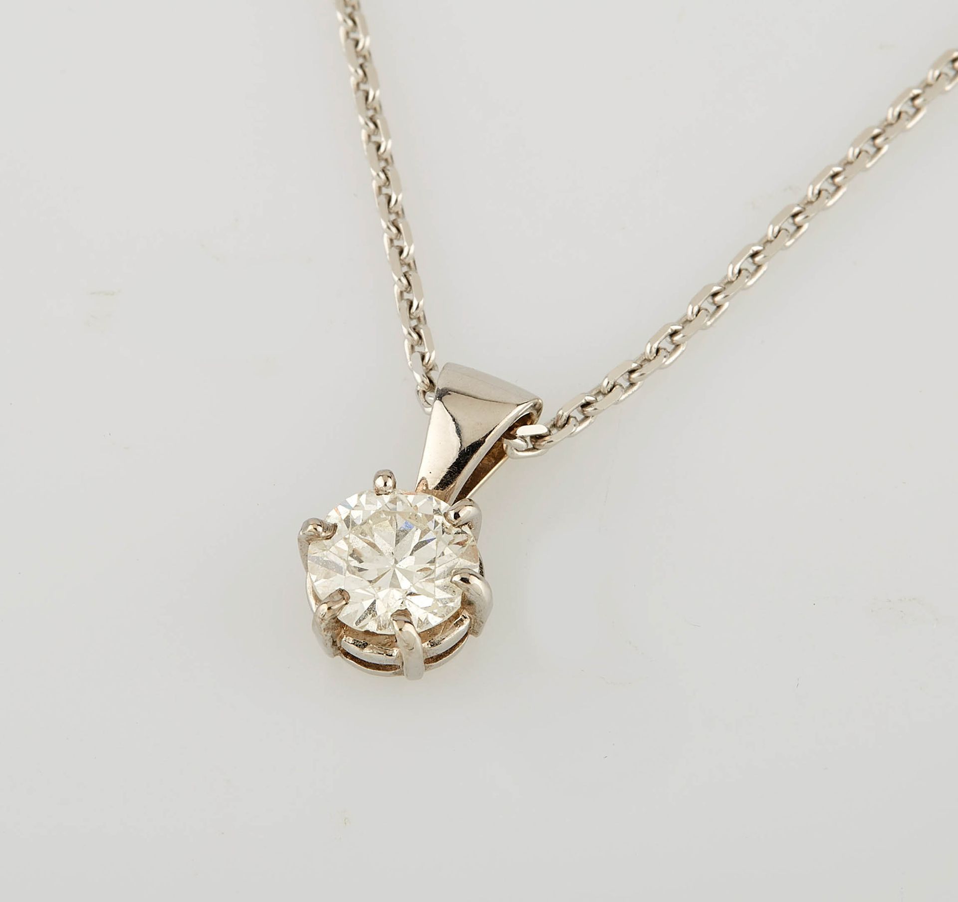 Null White gold pendant set with a 2 ct. Diamond. (greying on the edges, small c&hellip;