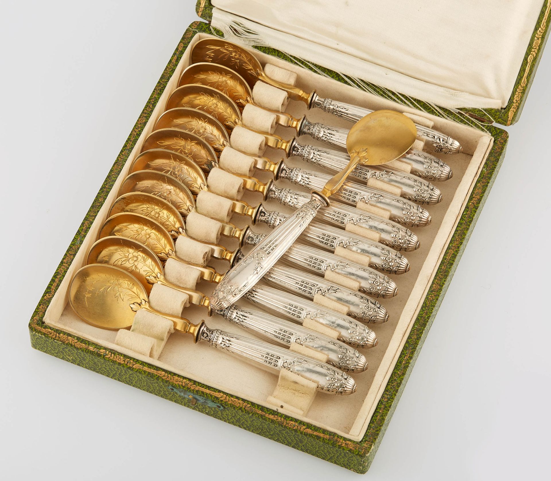 Null Set of twelve gilt metal ice spoons with spoons engraved with flowers and s&hellip;