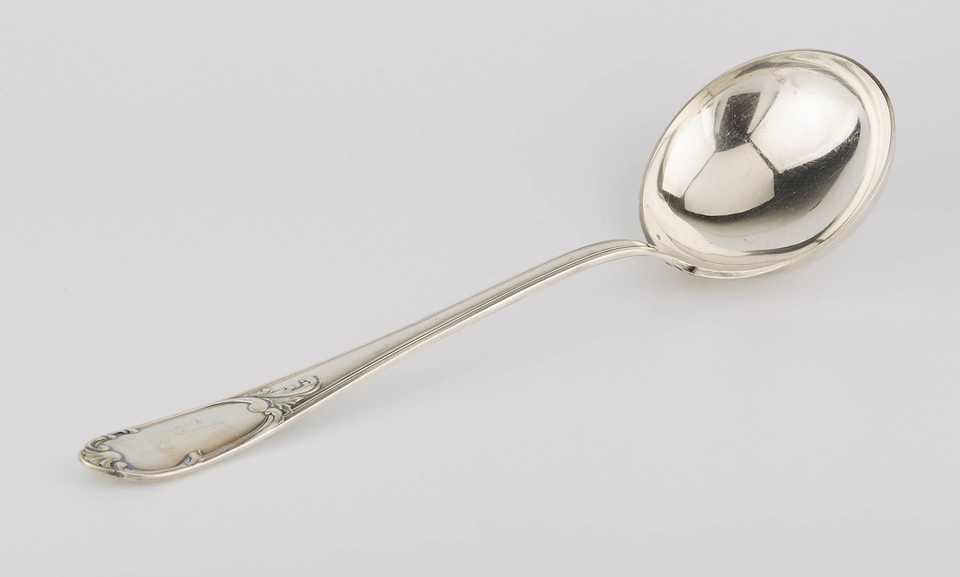 Null Ladle in silver model net chased of foliage. Style L. XV. Minerve mark. M.O&hellip;