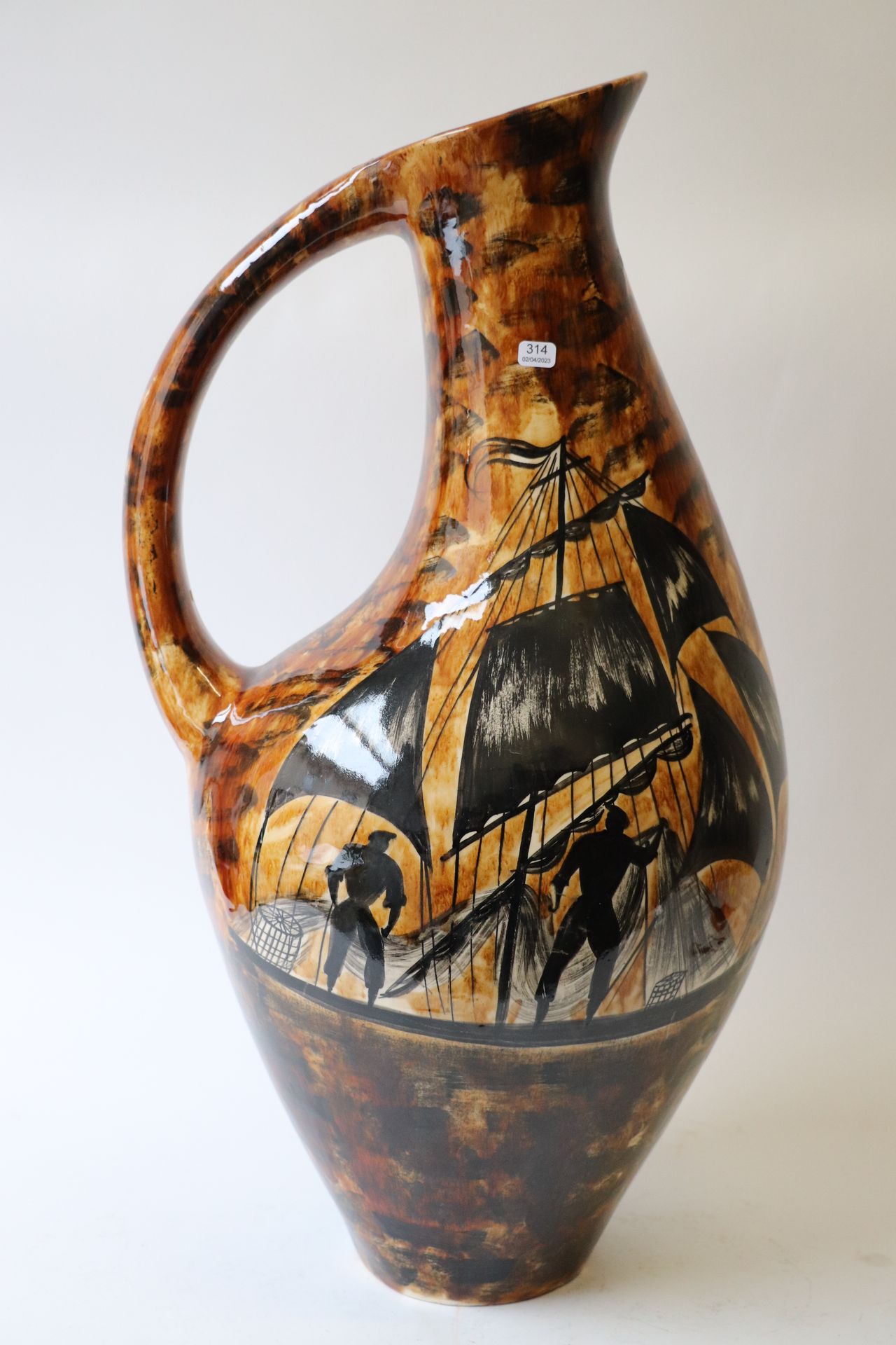 Null Quimper. Very large earthenware pitcher decorated with boat and sailors. Si&hellip;