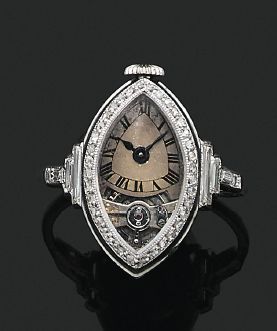 Null BAGUE «MONTRE ART DÉCO»
Diamants tailles rose et baguette, platine (850)
Bo&hellip;