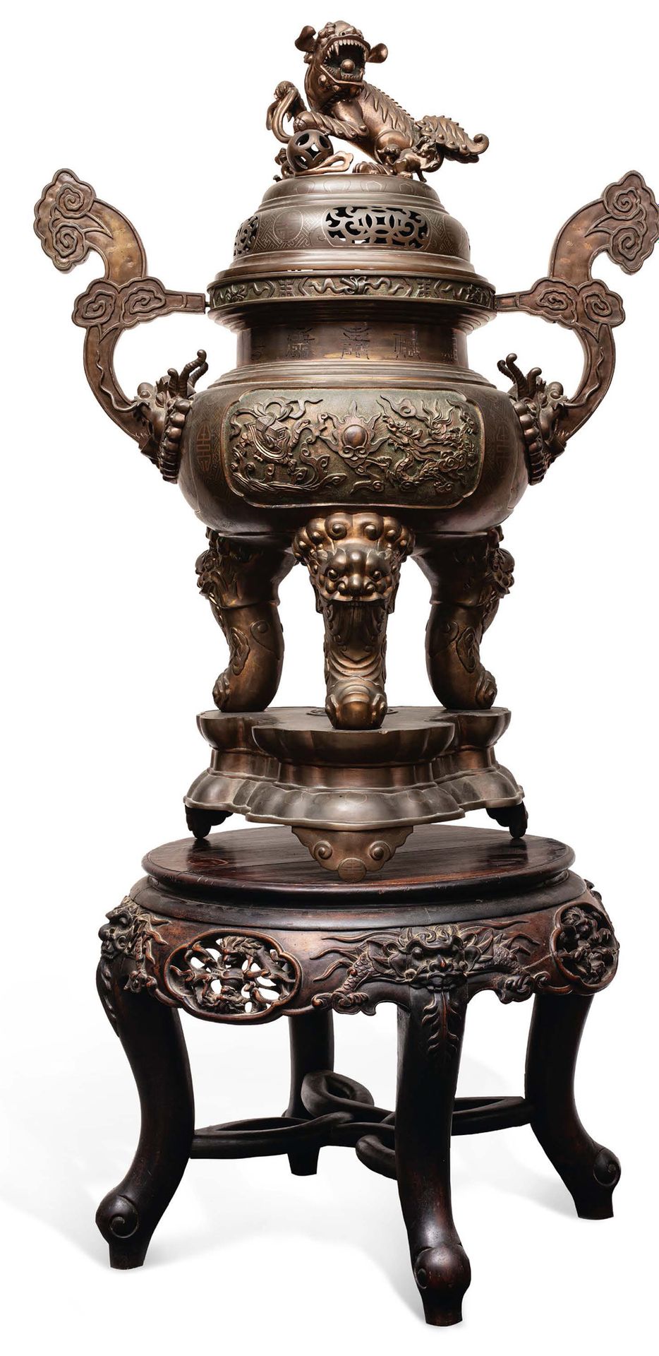 Vietnam vers 1900 
A large three-part covered bronze incense burner with a medal&hellip;