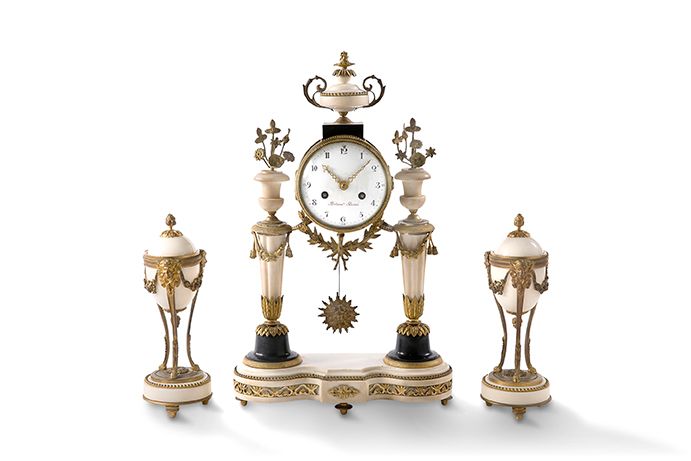Null A white marble and chased bronze CHESTLACE comprising a portico clock, the &hellip;