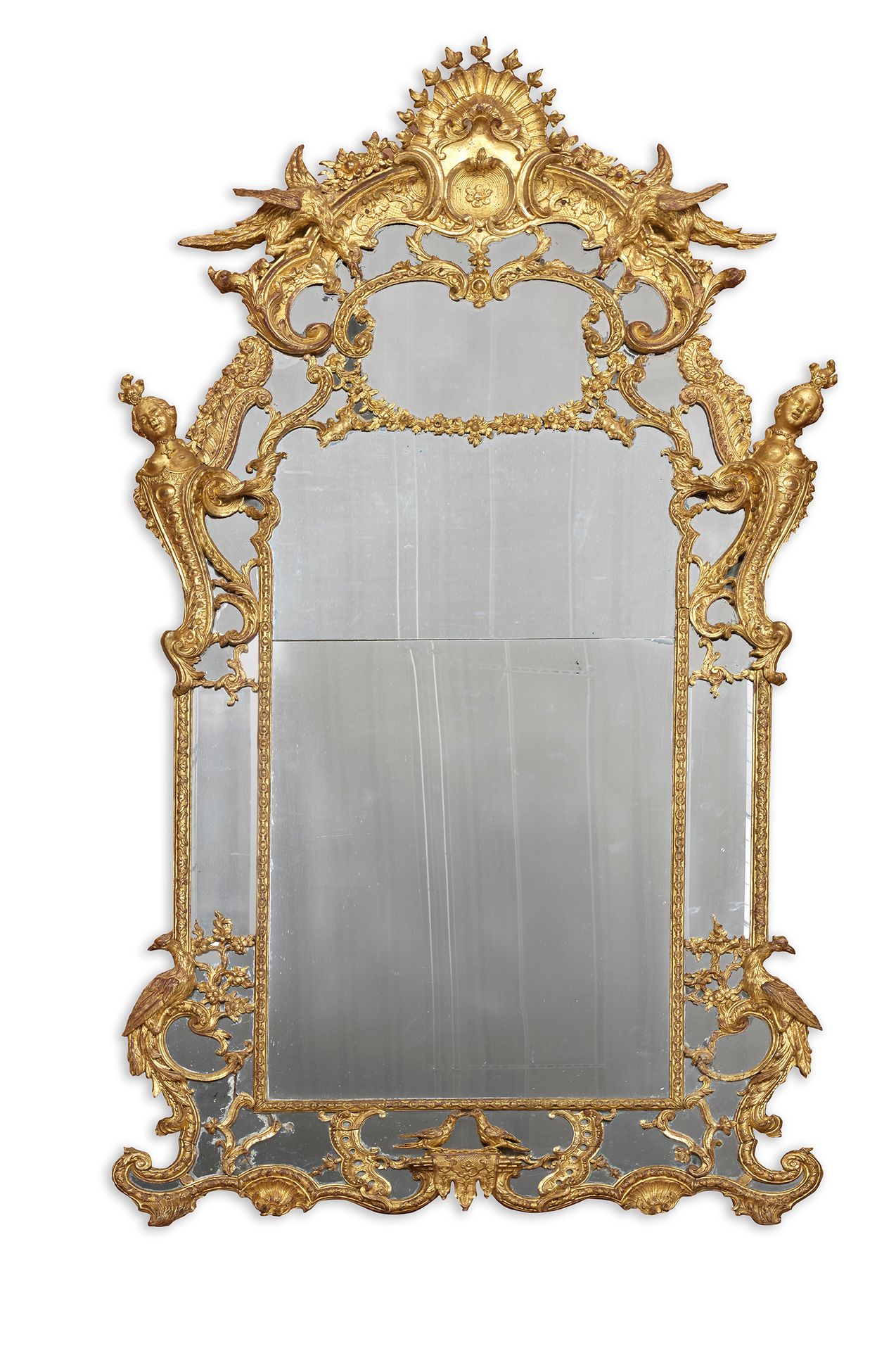 Null 
A MONUMENTAL MIRROR with carved and gilded wood glazing, richly decorated &hellip;