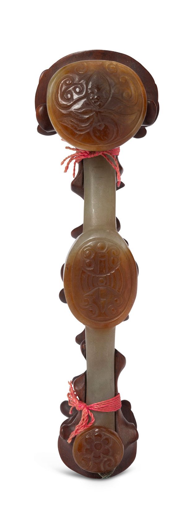 CHINE XXe siècle 
Celadon jade ruyi scepter infused with rust decorated with flo&hellip;