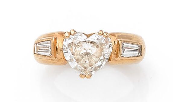 Null ANELLO "CUORE
Diamante a cuore, diamante a trapezio
Oro 18k (750)
Peso: 1,7&hellip;